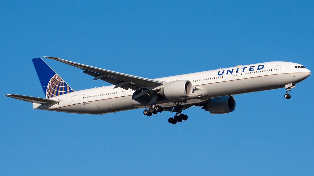 Photo of N2654U - United Airlines Boeing 777-300ER at IAD on AeroXplorer Aviation Database Photo of N2654U - United Airlines Boeing 777-300ER at IAD on AeroXplorer Aviation Database