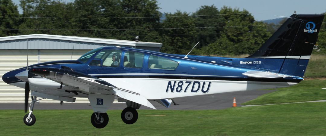Photo of N87DU - PRIVATE Beechcraft 55 Baron at N94 on AeroXplorer Aviation Database Photo of N87DU - PRIVATE Beechcraft 55 Baron at N94 on AeroXplorer Aviation Database