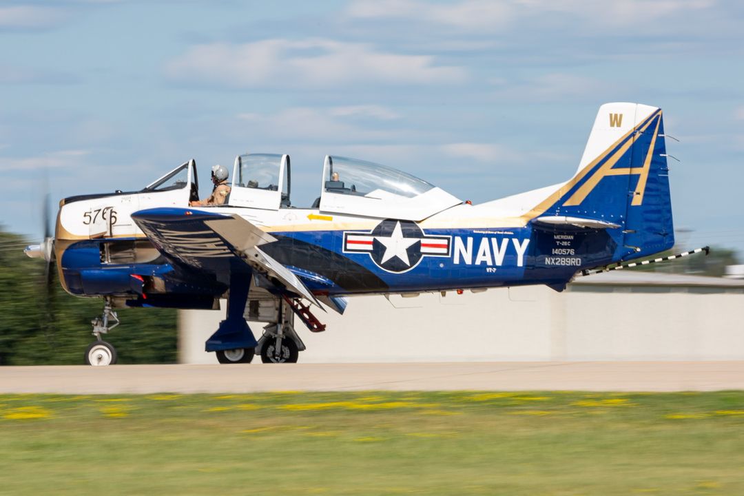Photo of N289RD - PRIVATE North American T-28C Trojan at OSH on AeroXplorer Aviation Database Photo of N289RD - PRIVATE North American T-28C Trojan at OSH on AeroXplorer Aviation Database