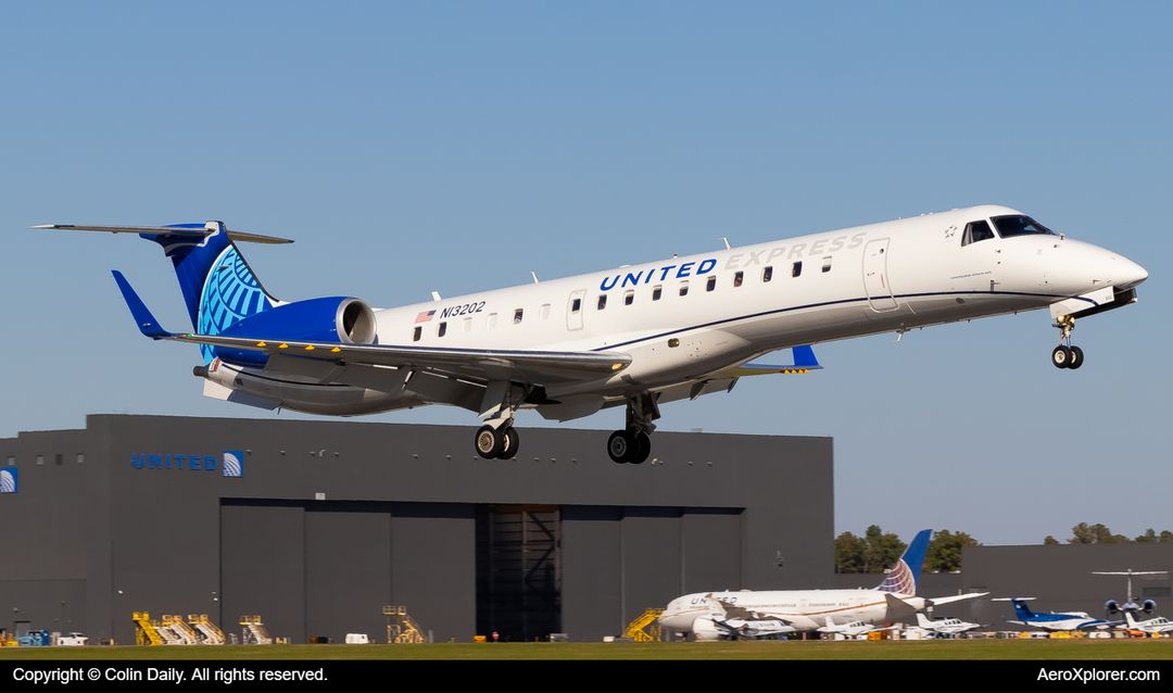 Photo of N13202 - United Express Embraer ERJ145 at IAD on AeroXplorer Aviation Database Photo of N13202 - United Express Embraer ERJ145 at IAD on AeroXplorer Aviation Database