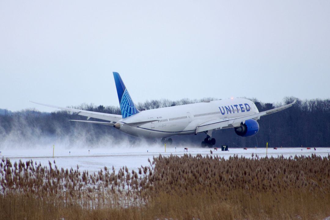 Photo of N13013 - United Airlines Boeing 787-10 at GRB on AeroXplorer Aviation Database