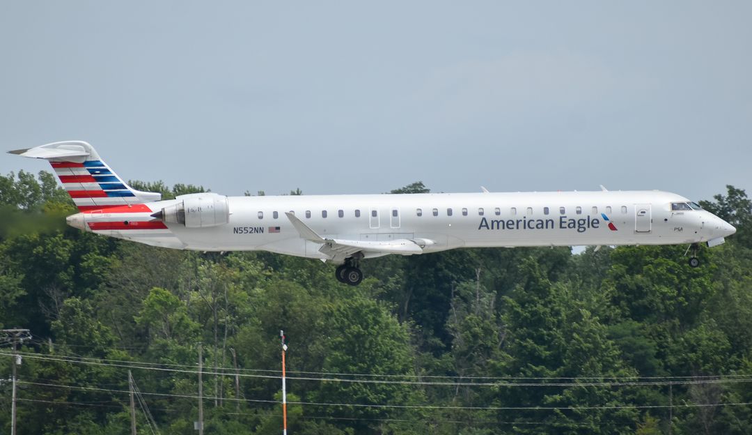 Photo of N552NN - American Eagle Mitsubishi CRJ-900 at CVG on AeroXplorer Aviation Database Photo of N552NN - American Eagle Mitsubishi CRJ-900 at CVG on AeroXplorer Aviation Database