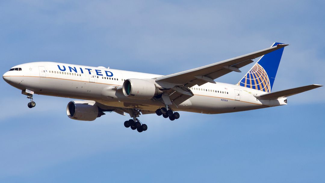 Photo of N213UA - United Airlines Boeing 777-200 at IAH on AeroXplorer Aviation Database Photo of N213UA - United Airlines Boeing 777-200 at IAH on AeroXplorer Aviation Database
