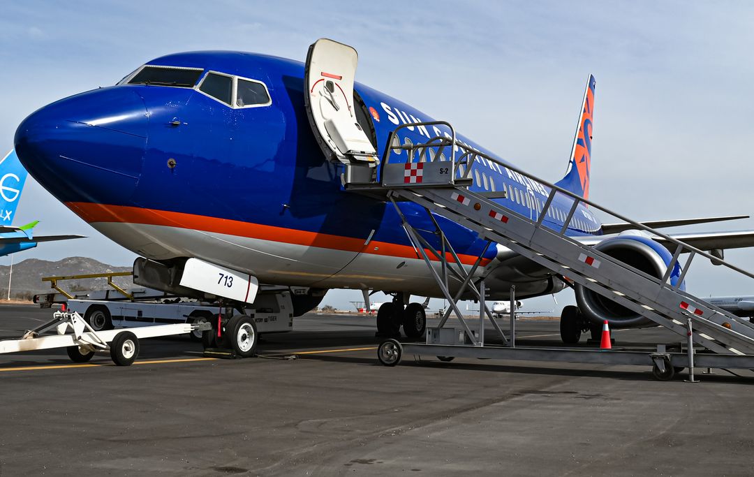 Photo of N713SY - Sun Country Airlines Boeing 737-700 at CSL on AeroXplorer Aviation Database Photo of N713SY - Sun Country Airlines Boeing 737-700 at CSL on AeroXplorer Aviation Database
