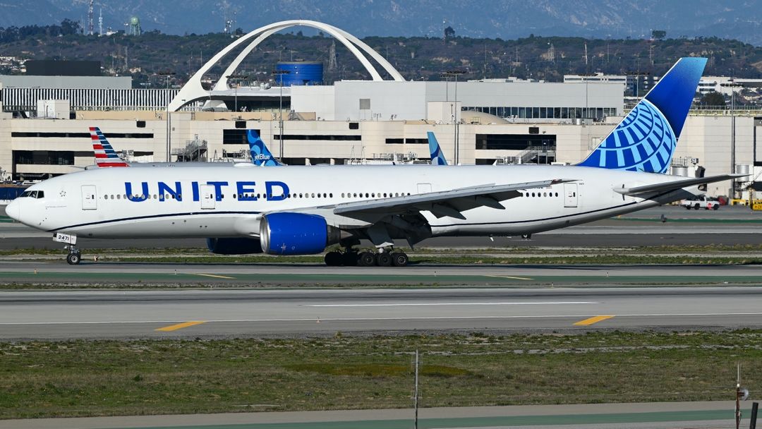 Photo of N771UA - United Airlines Boeing 777-200 at LAX on AeroXplorer Aviation Database Photo of N771UA - United Airlines Boeing 777-200 at LAX on AeroXplorer Aviation Database