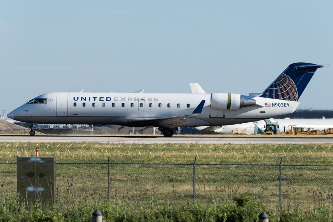 Photo of N903EV - United Express Mitsubishi CRJ-200 at ORD on AeroXplorer Aviation Database Photo of N903EV - United Express Mitsubishi CRJ-200 at ORD on AeroXplorer Aviation Database