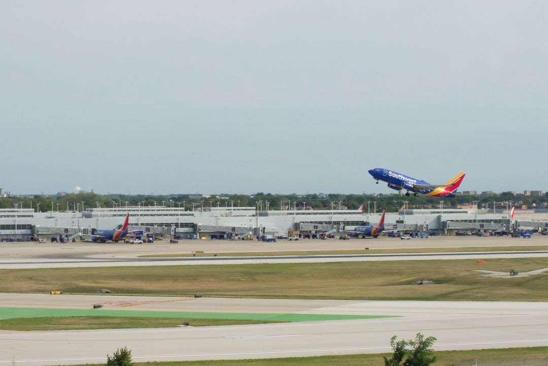Airport Photo registration  on final approach at Chicago Midway International Airport (MDW/KMDW) photographed by  on 05/18/52671