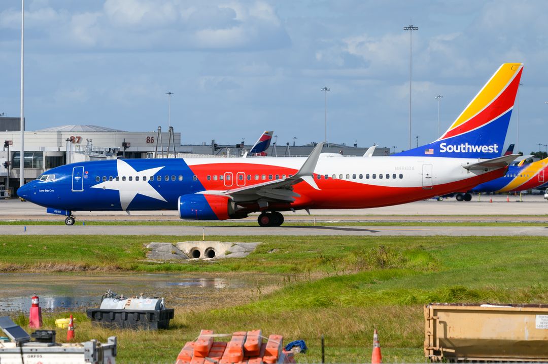 Photo of N8660A - Southwest Airlines Boeing 737-800 at MCO on AeroXplorer Aviation Database