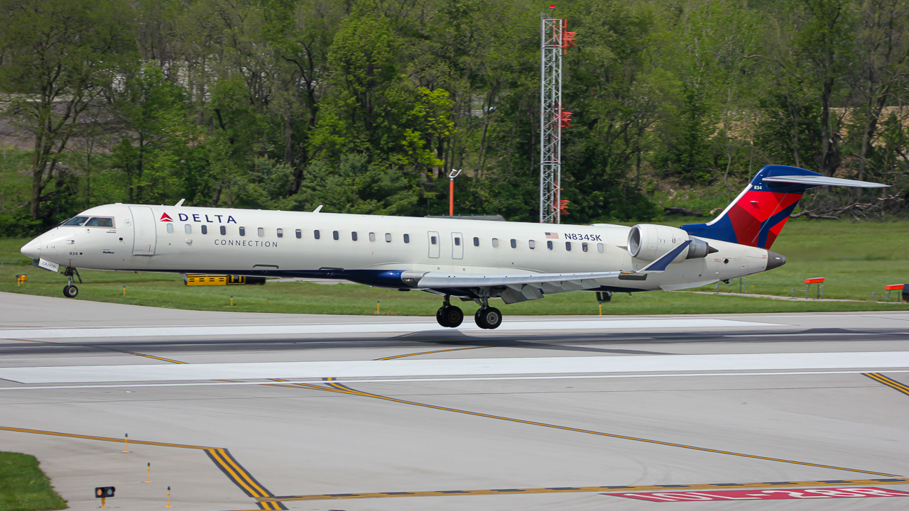 Full size: Delta Connection Mitsubishi CRJ-900LR N834SK at John Glenn Columbus International Airport