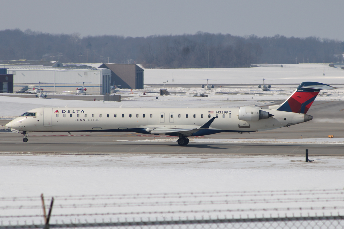Full size: Delta Airlines Mitsubishi CRJ-900 N329PQ at Cincinnati/Northern Kentucky International Airport