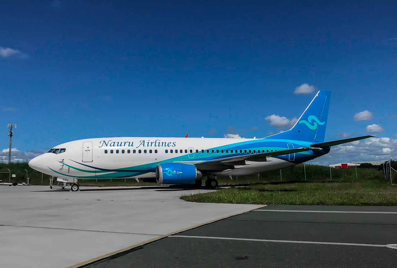 Full size: Nauru Airlines Boeing 737-300 VH-XNU at Brisbane Airport