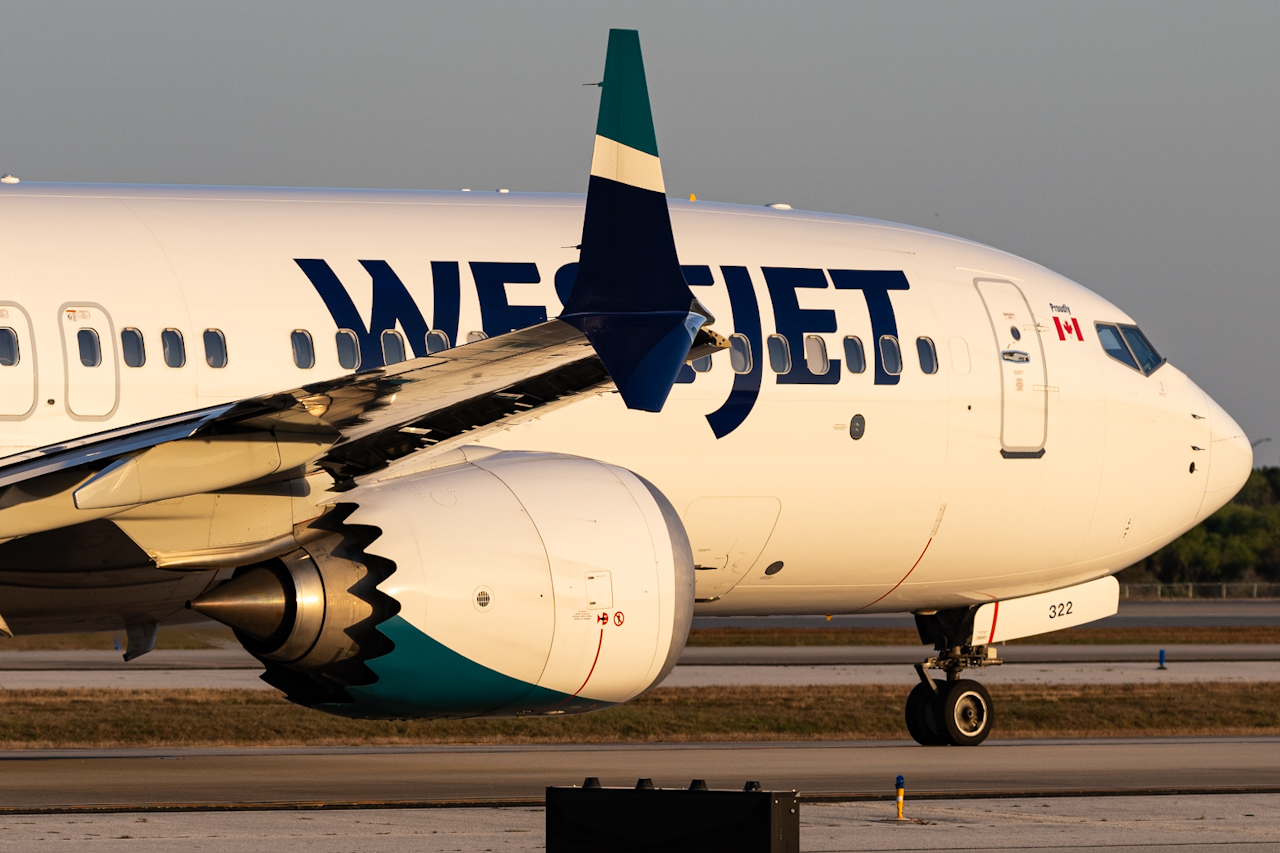 Full size: WestJet Boeing 737 MAX 8 C-FBWS at Orlando International Airport