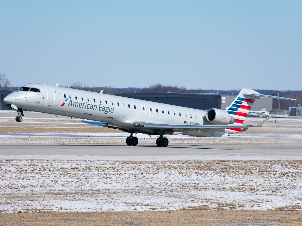 Full size: PSA Airlines Mitsubishi CRJ-900 N599NN at Gerald R Ford International Airport