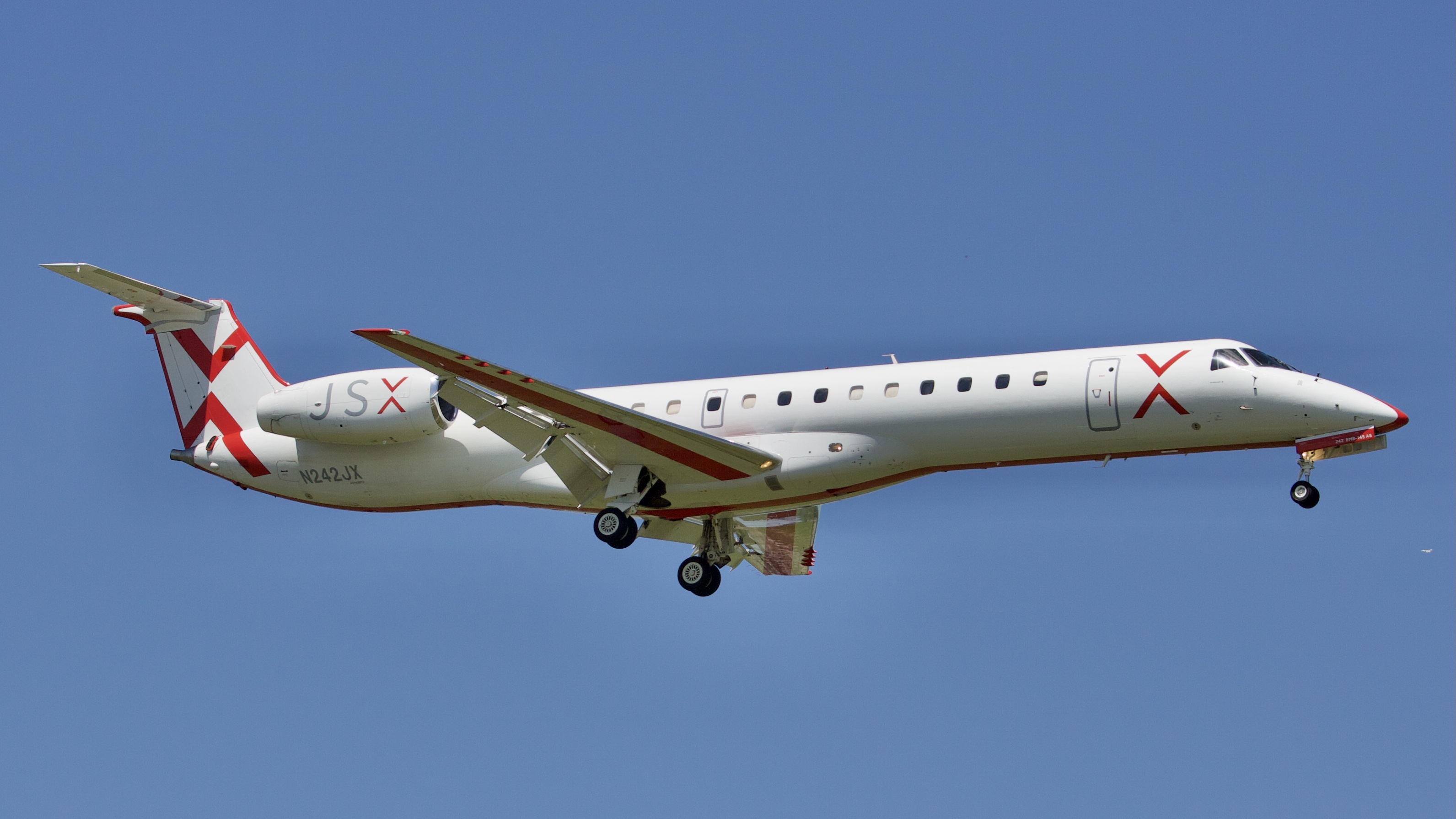 Full size: JetSuiteX Embraer ERJ145 N242JX at William P Hobby Airport