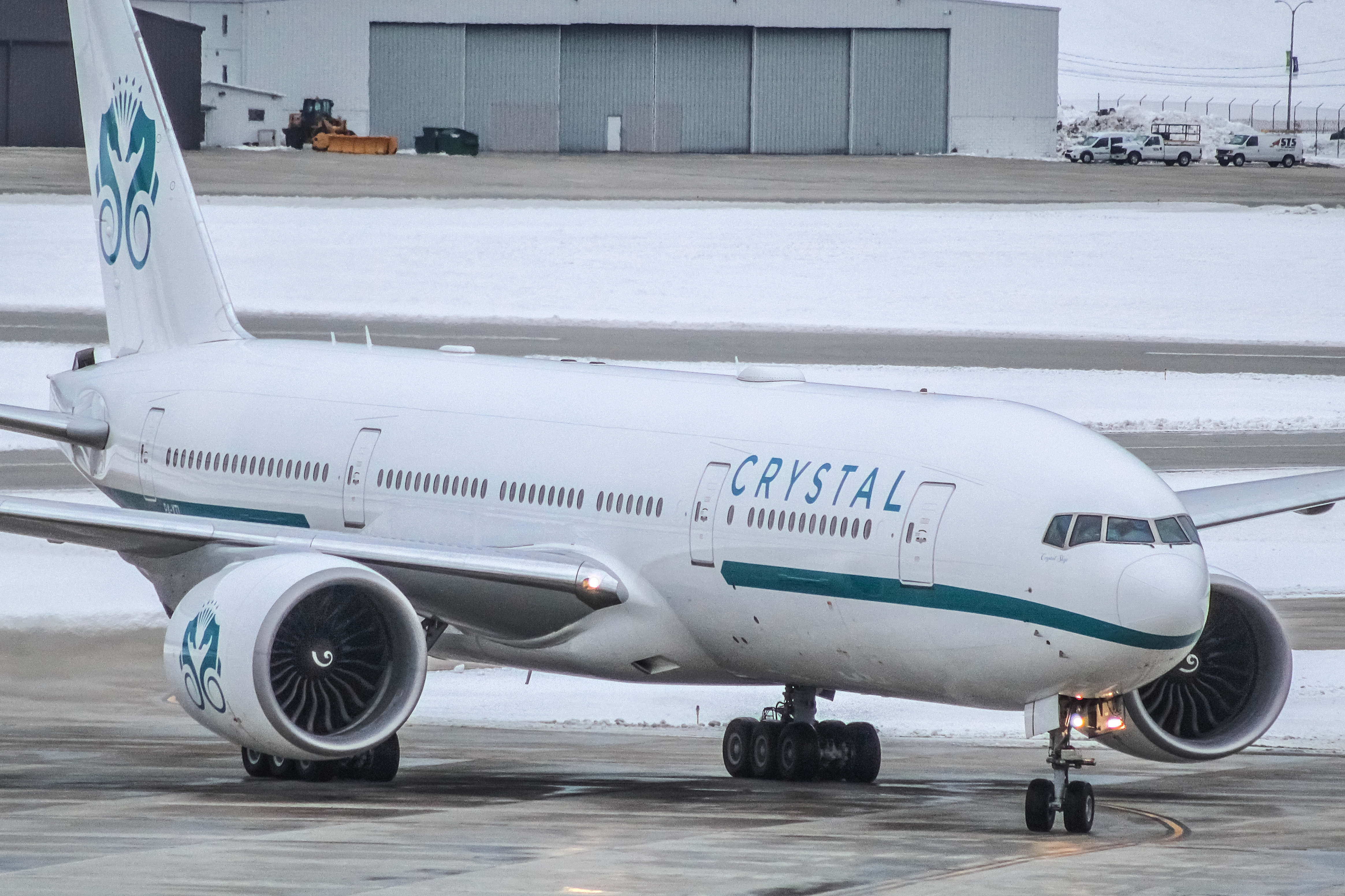 Full size: Crystal AirCruises Boeing 777-200LR P4-XTL at General Mitchell International Airport