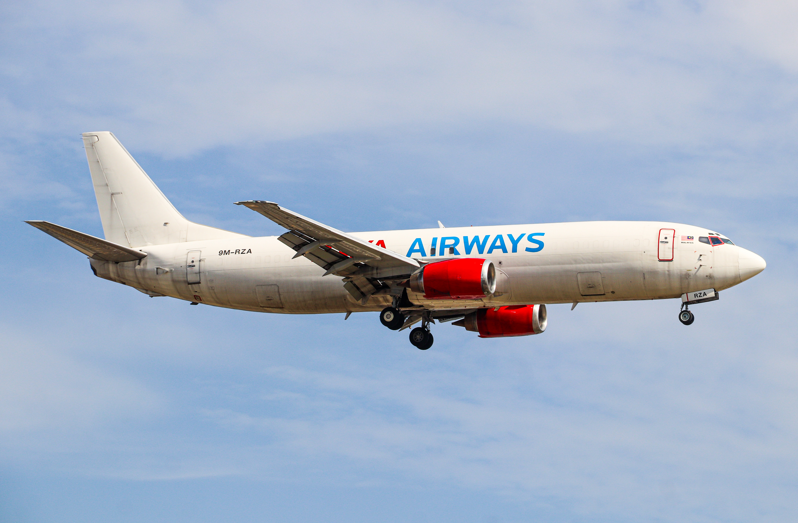 Full size: RAYA AIRWAYS Boeing 737-400F 9M-RZA at Hong Kong International Airport