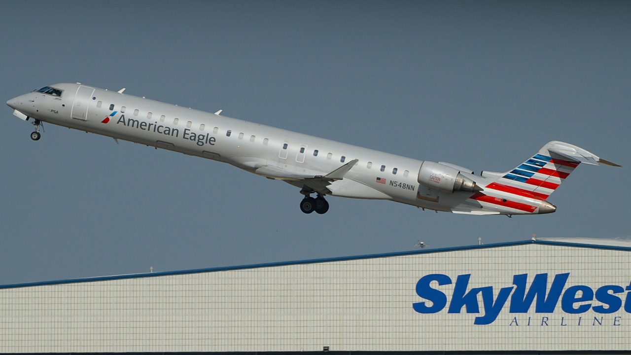 Full size: PSA Airlines Mitsubishi CRJ-900 N548WN at Will Rogers World Airport