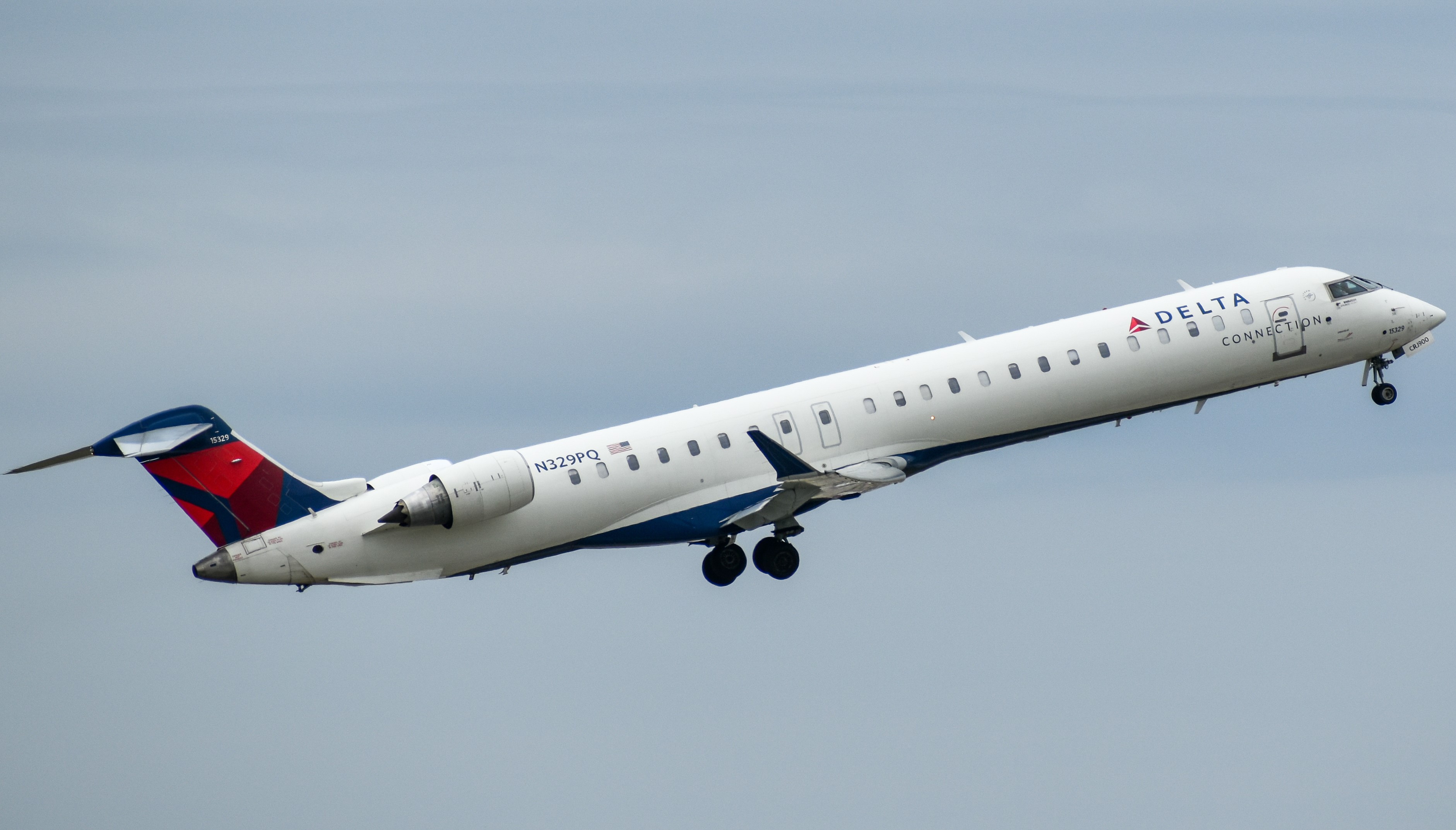 Full size: Delta Airlines Mitsubishi CRJ-900 N329PQ at Cincinnati/Northern Kentucky International Airport