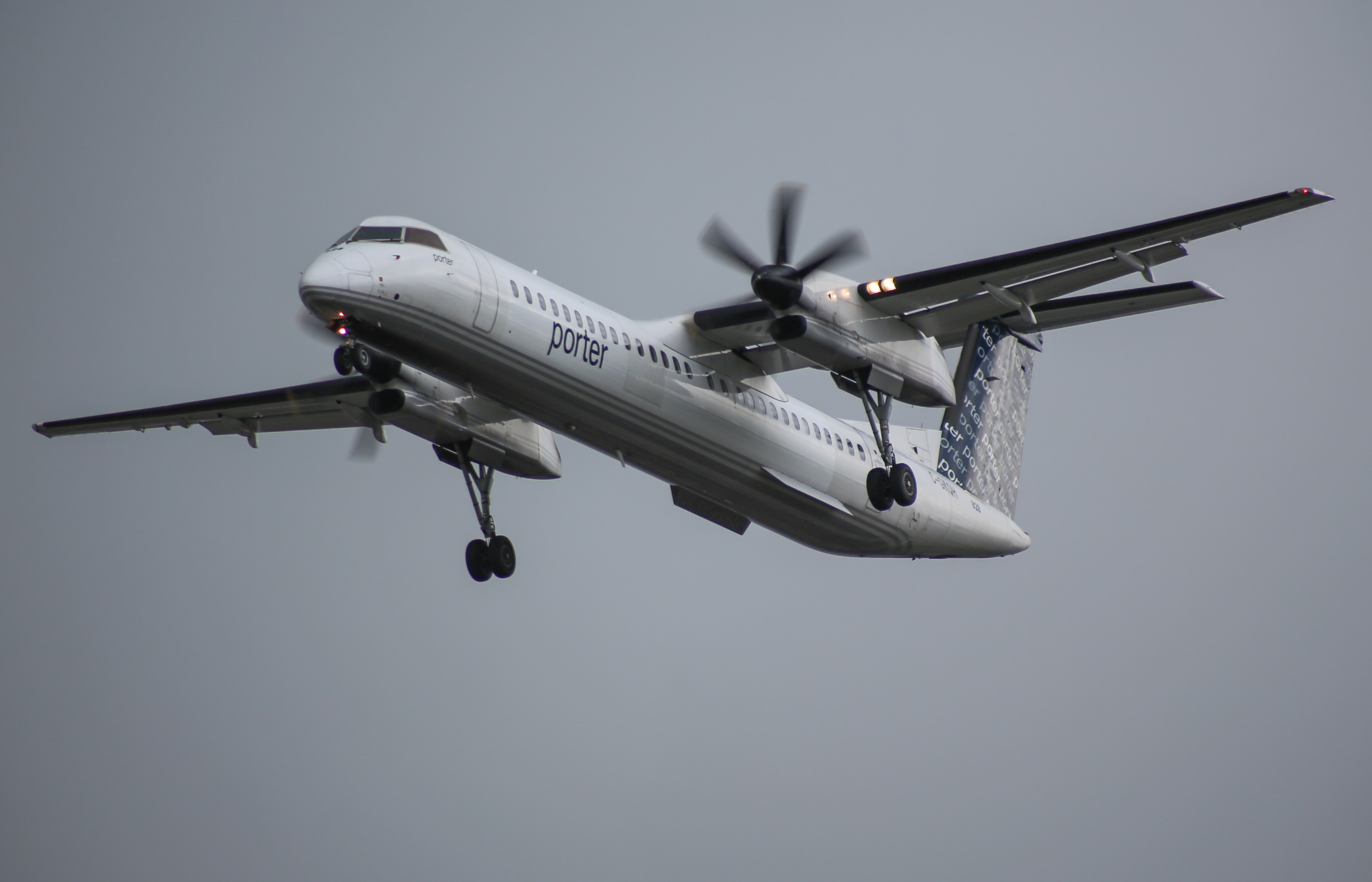 Full size: Porter Airlines De Havilland Dash-8 q400 C-GKQH at Calgary International Airport