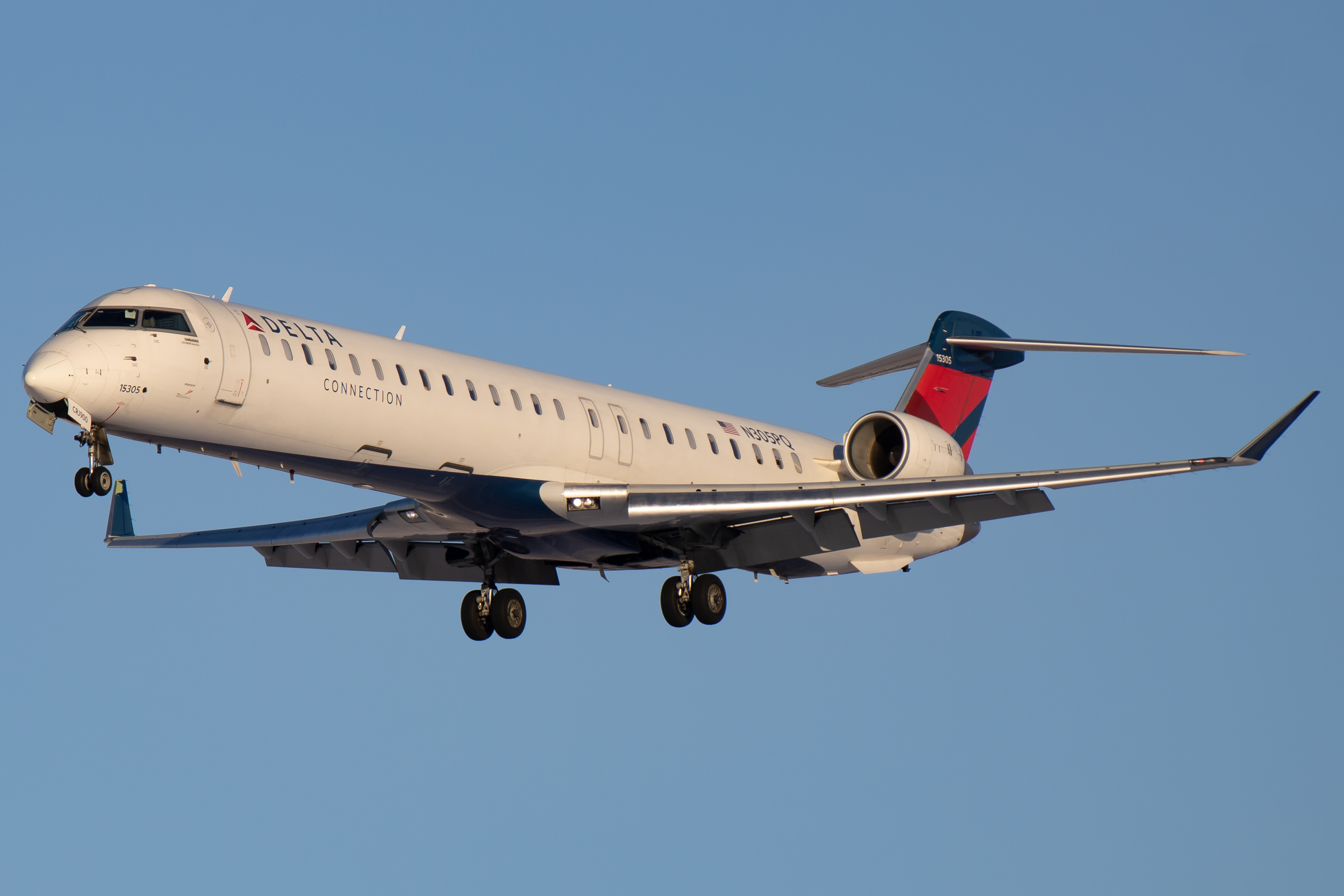 Full size: Delta Connection Mitsubishi CRJ-900 N305PQ at Cedar Rapids Eastern Iowa Airport