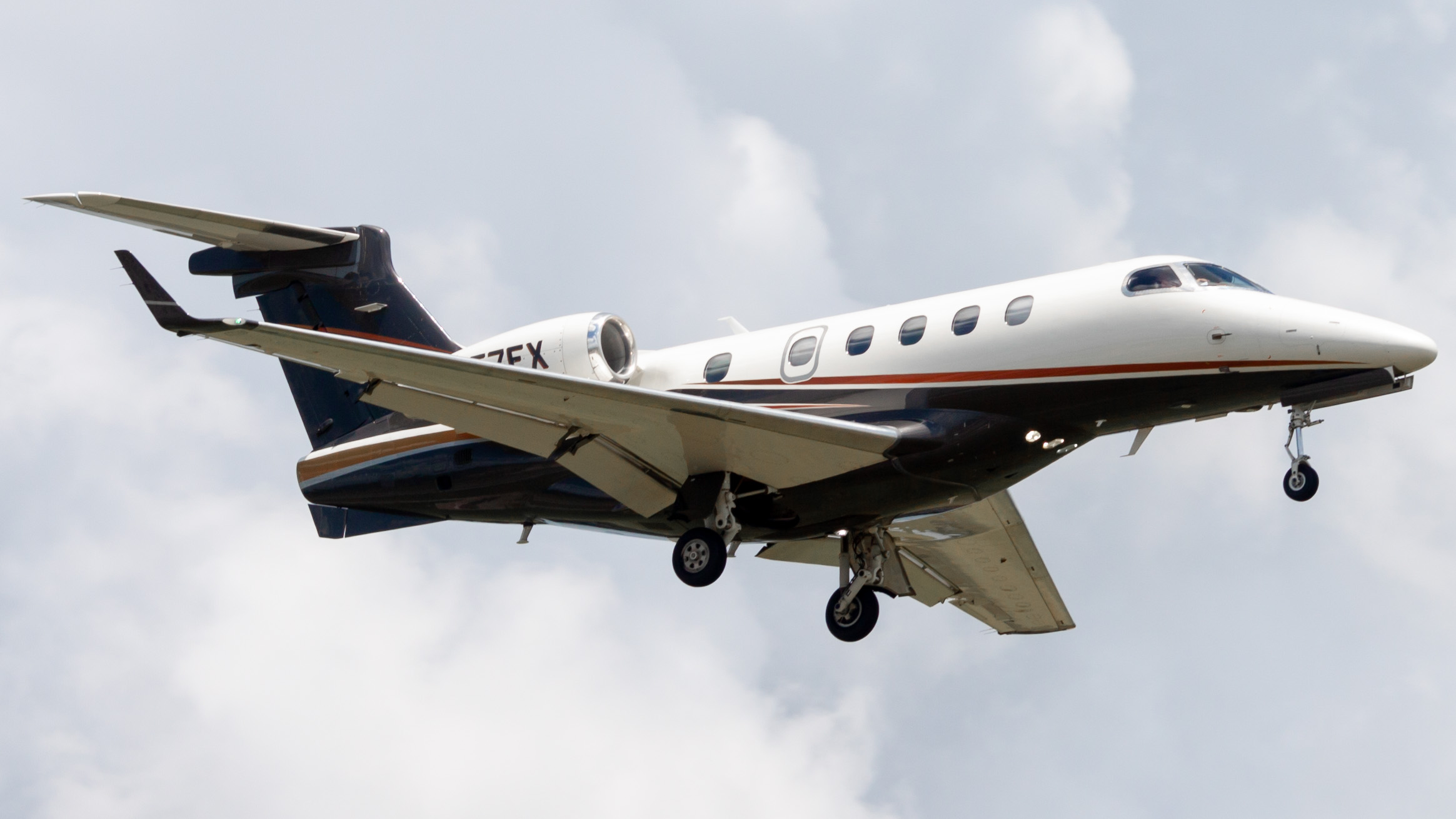 Full size: FlexJet Embraer Phenom 300 N357FX at William P Hobby Airport