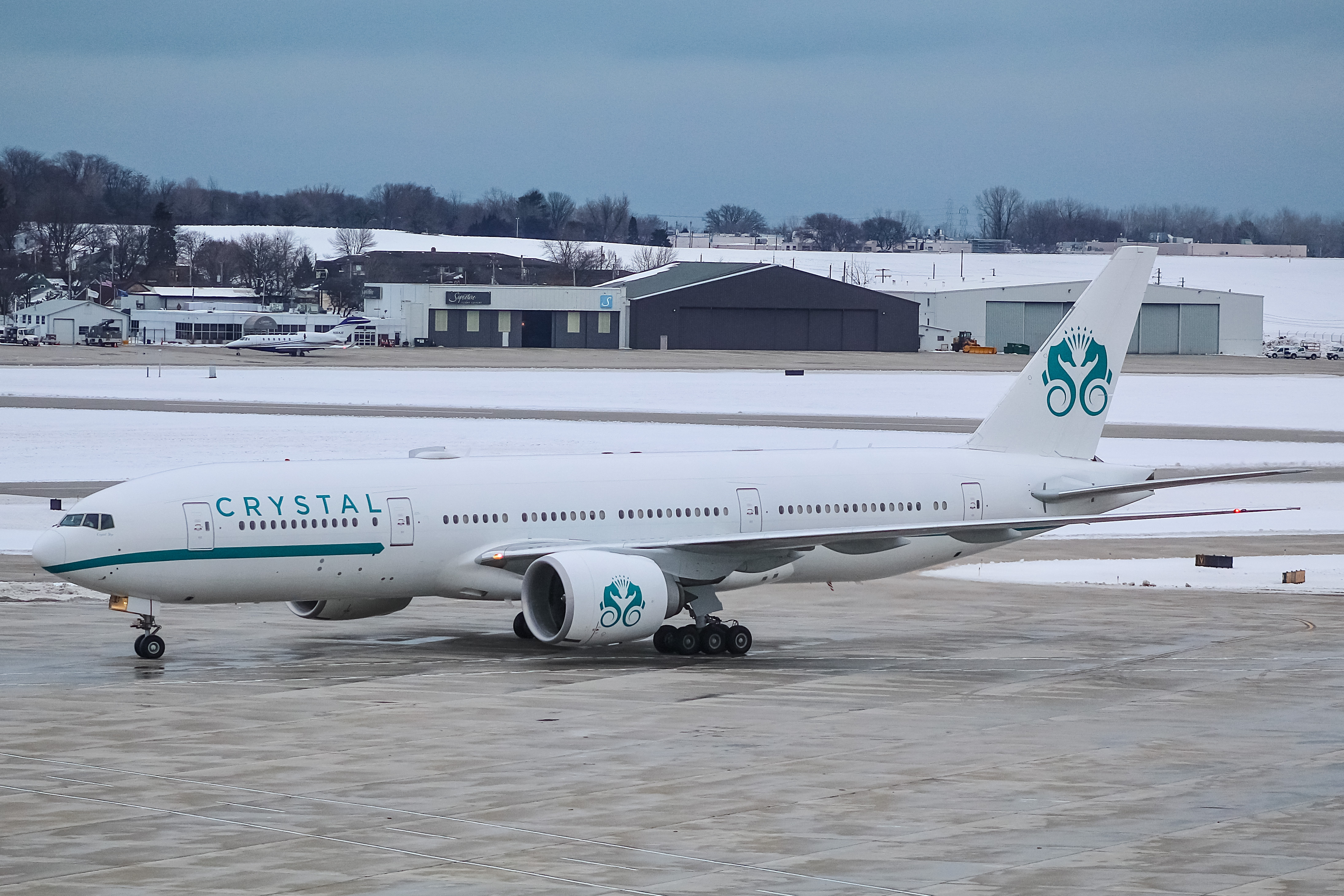 Full size: Crystal Airways Boeing 777-200LR P4-XTL at General Mitchell International Airport