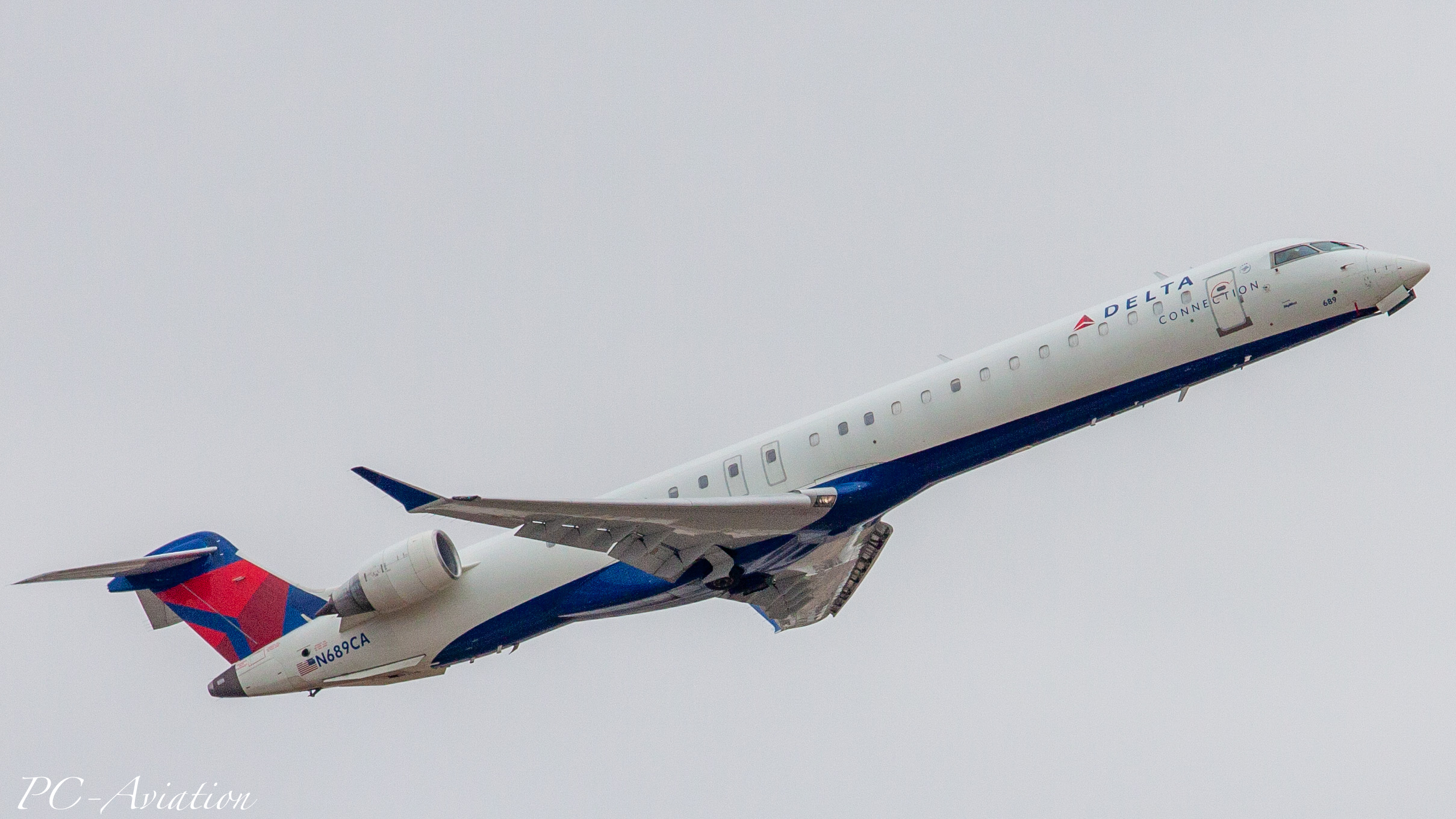 Full size: Delta Connection Mitsubishi CRJ-900 N689CA at Houston-George Bush Intercontinental Airport