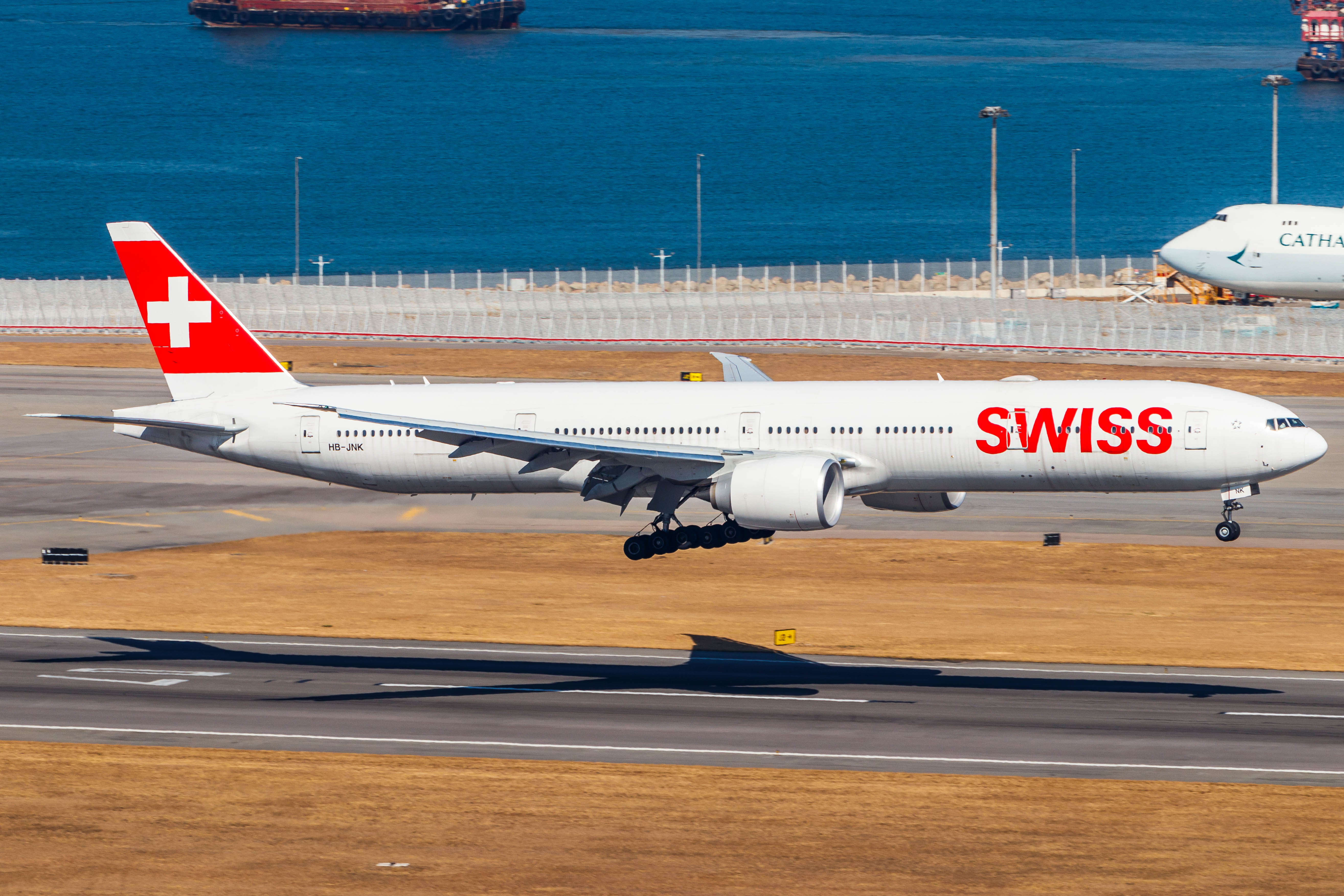 Full size: Swiss International Air Lines Boeing 777-300ER HB-JNK at Hong Kong International Airport