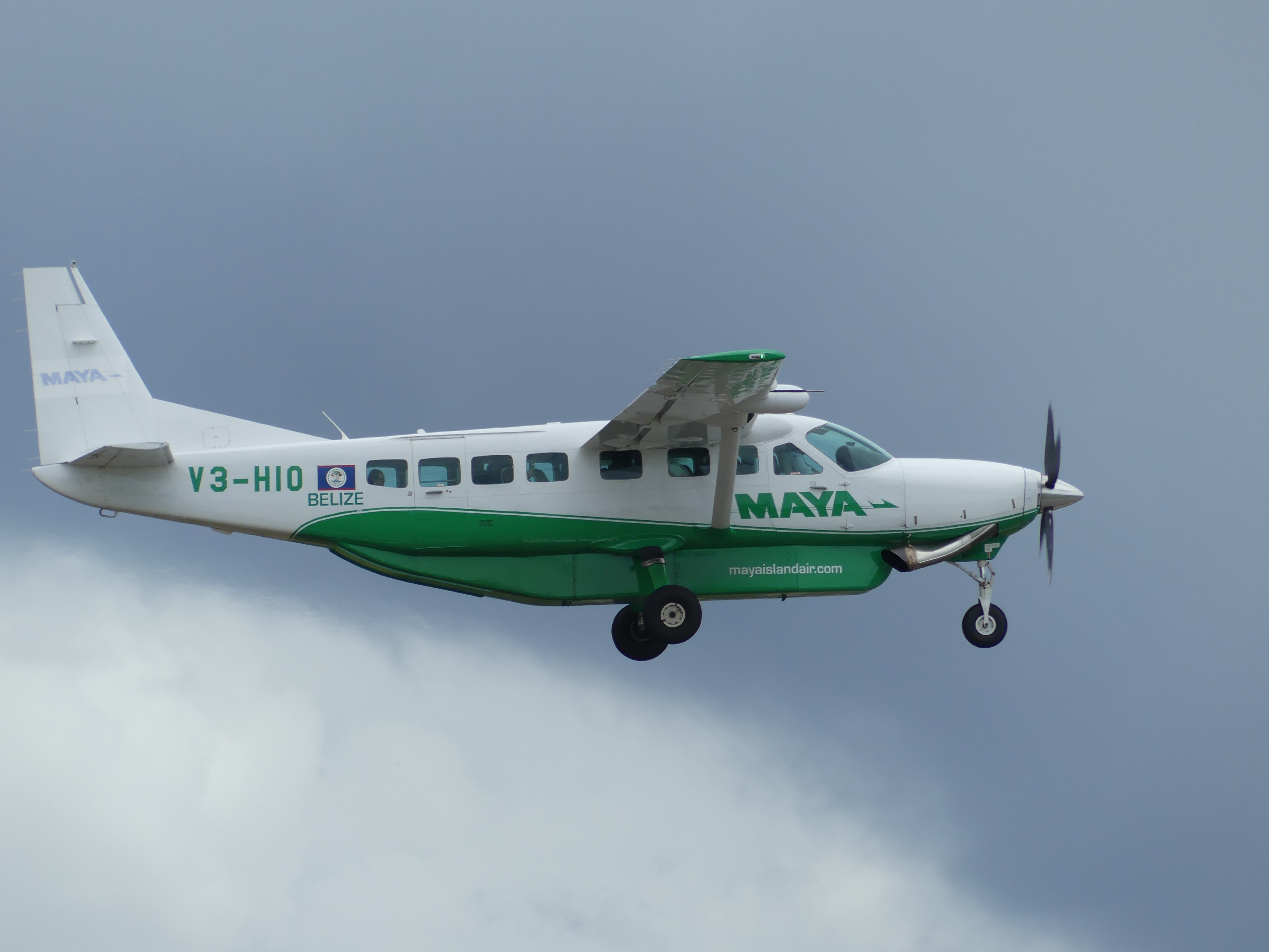 Full size: Maya Island Air  Cessna 208 Grand Caravan V3-HIO at Belize City Philip S. W. Goldson International Airport