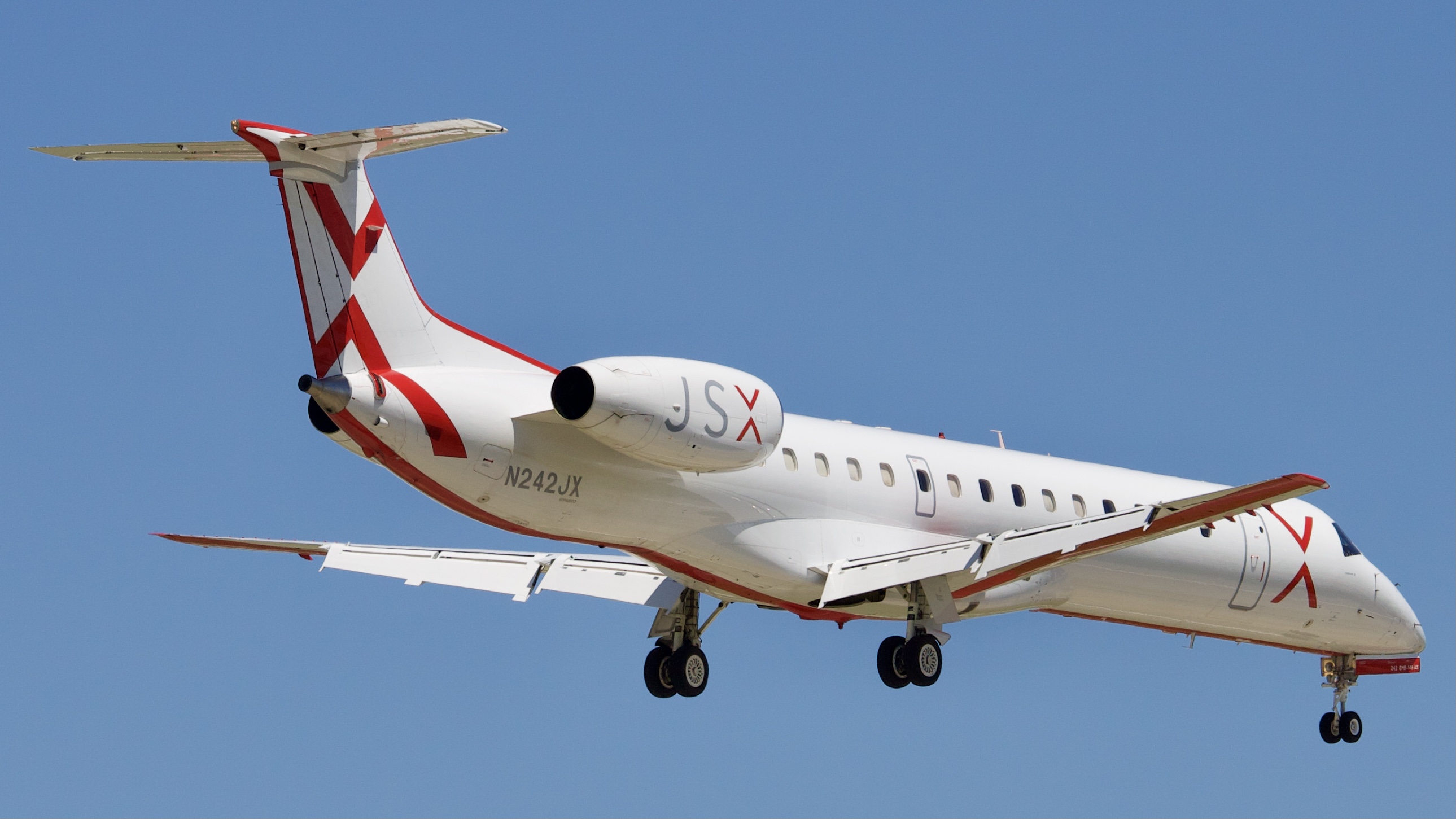 Full size: JetSuiteX Embraer ERJ145 N242JX at William P Hobby Airport