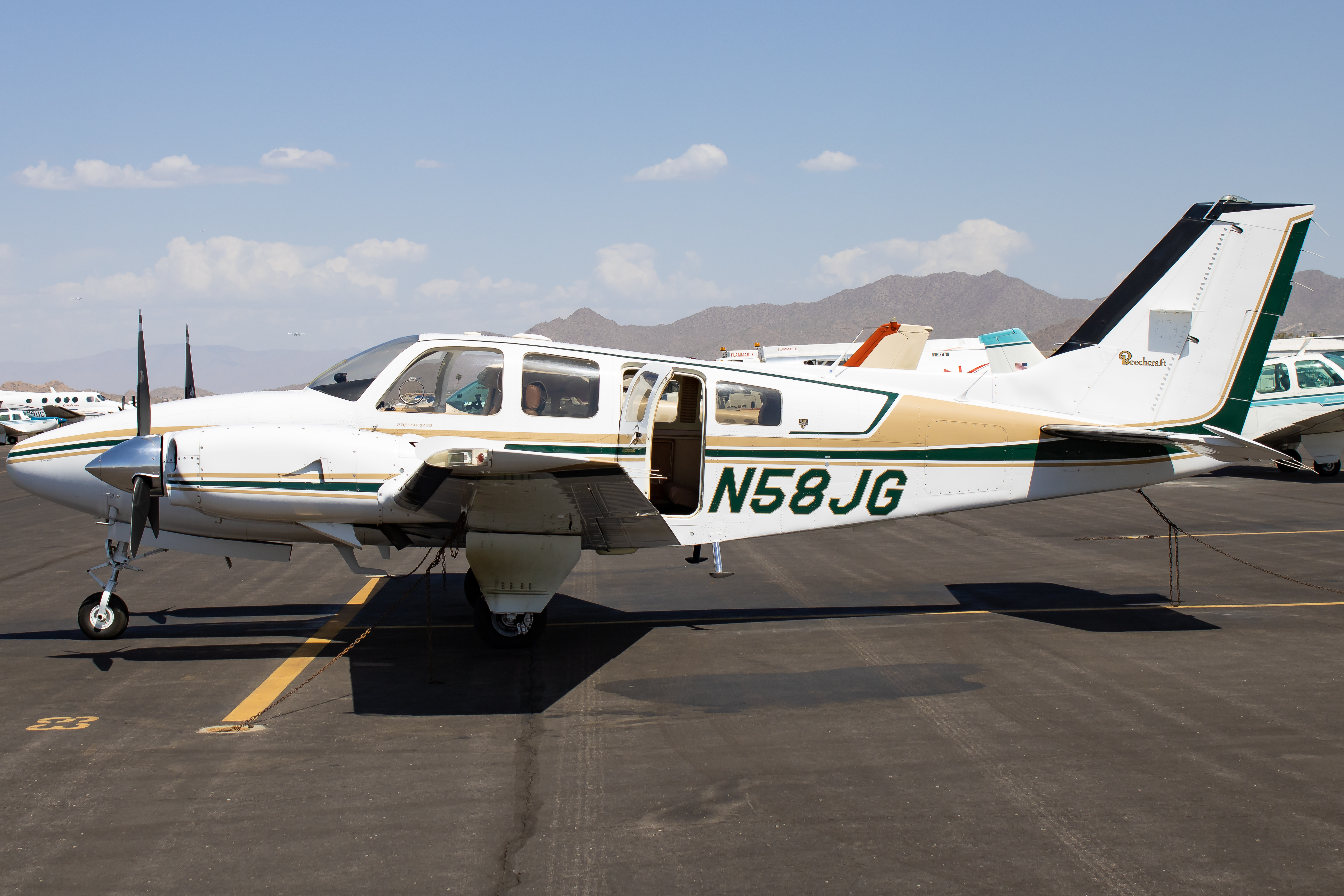 Full size: PRIVATE Beechcraft 58 Baron N58JG at Falcon Field Airport