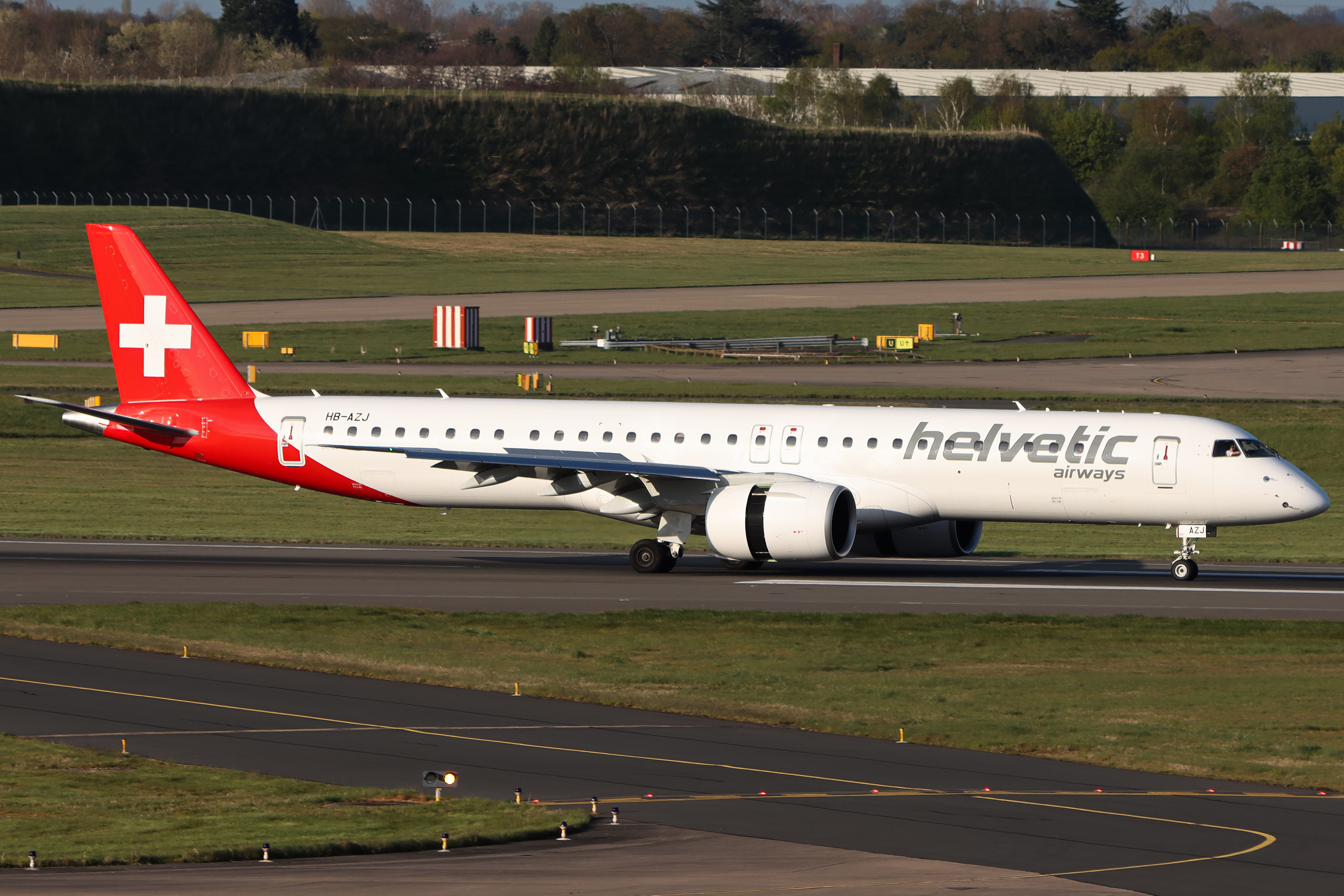 Full size: Helvetic Airways Embraer E195-E2 HB-AZJ at Birmingham Airport