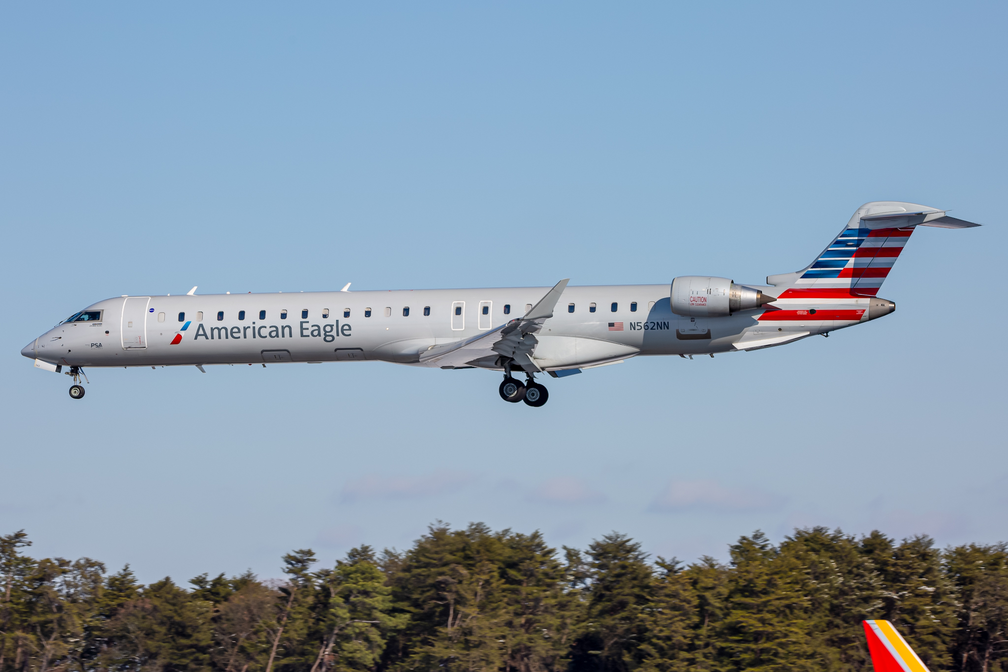 Full size: American Eagle Mitsubishi CRJ-900 N562NN at Baltimore/Washington International Thurgood Marshall Airport