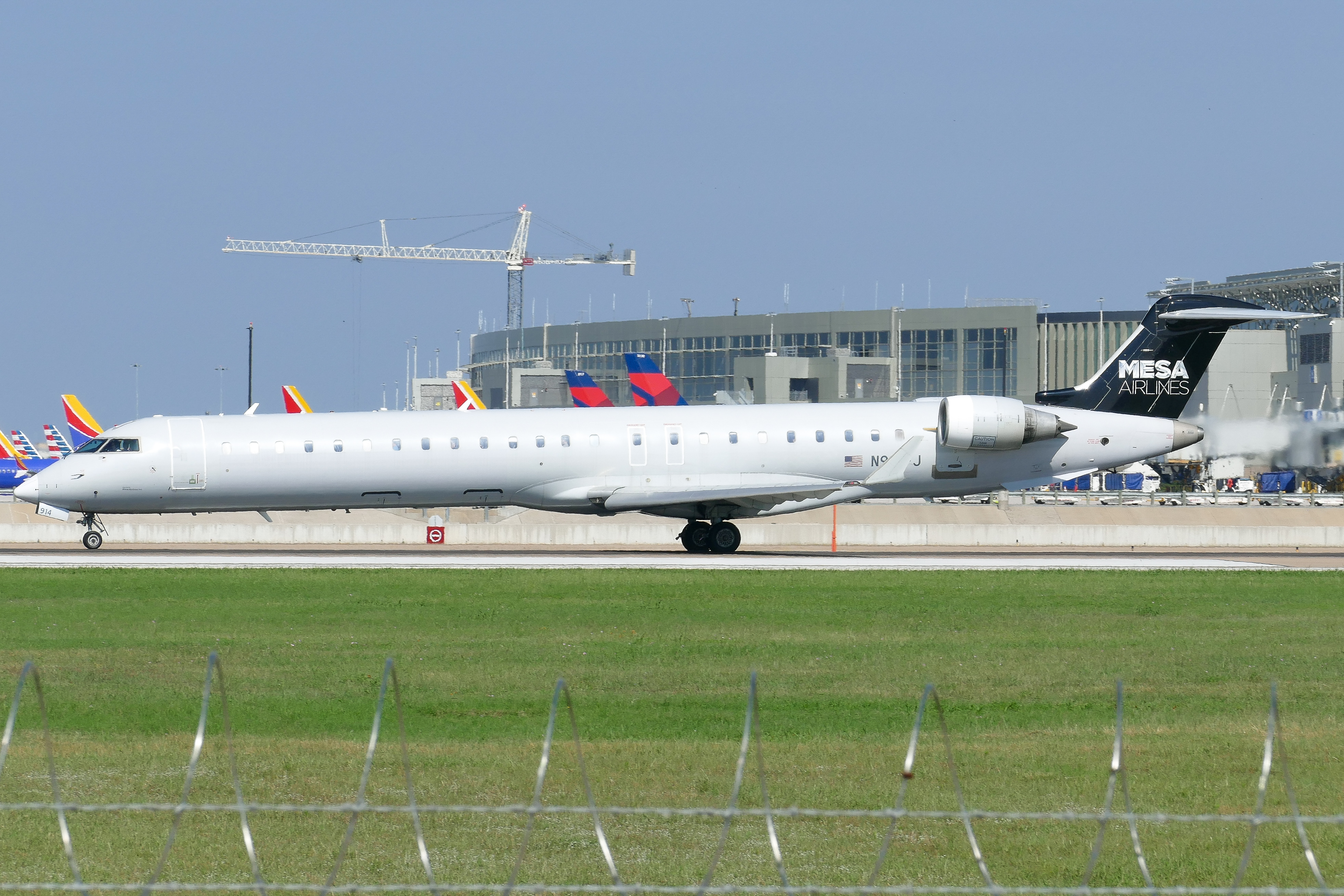 Full size: Mesa Airlines Mitsubishi CRJ-900 N914FJ at Austin-Bergstrom International Airport