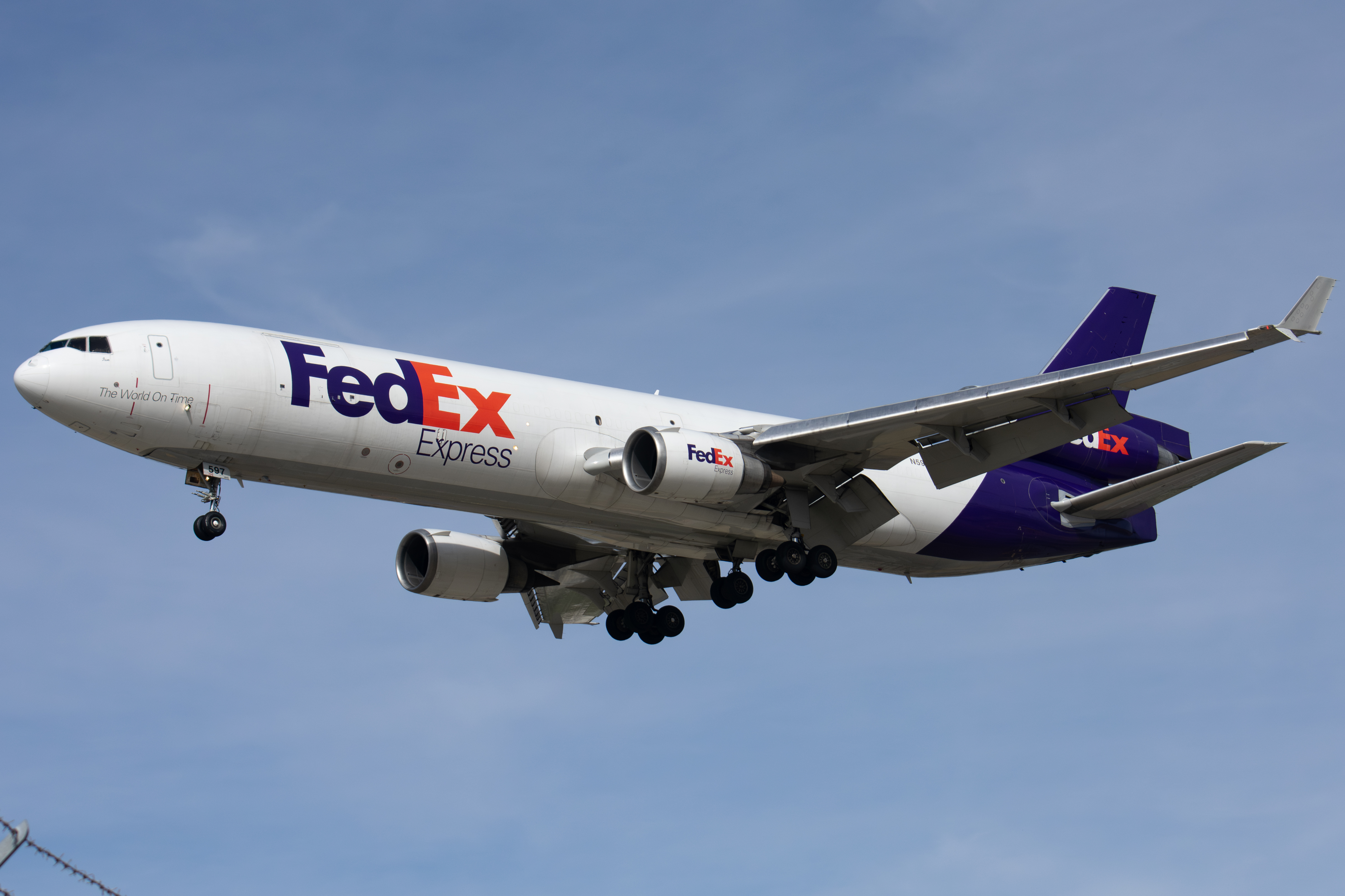 Full size: FedEx McDonnell Douglas MD-11(F) N597FE at Norman Y Mineta San Jose International Airport