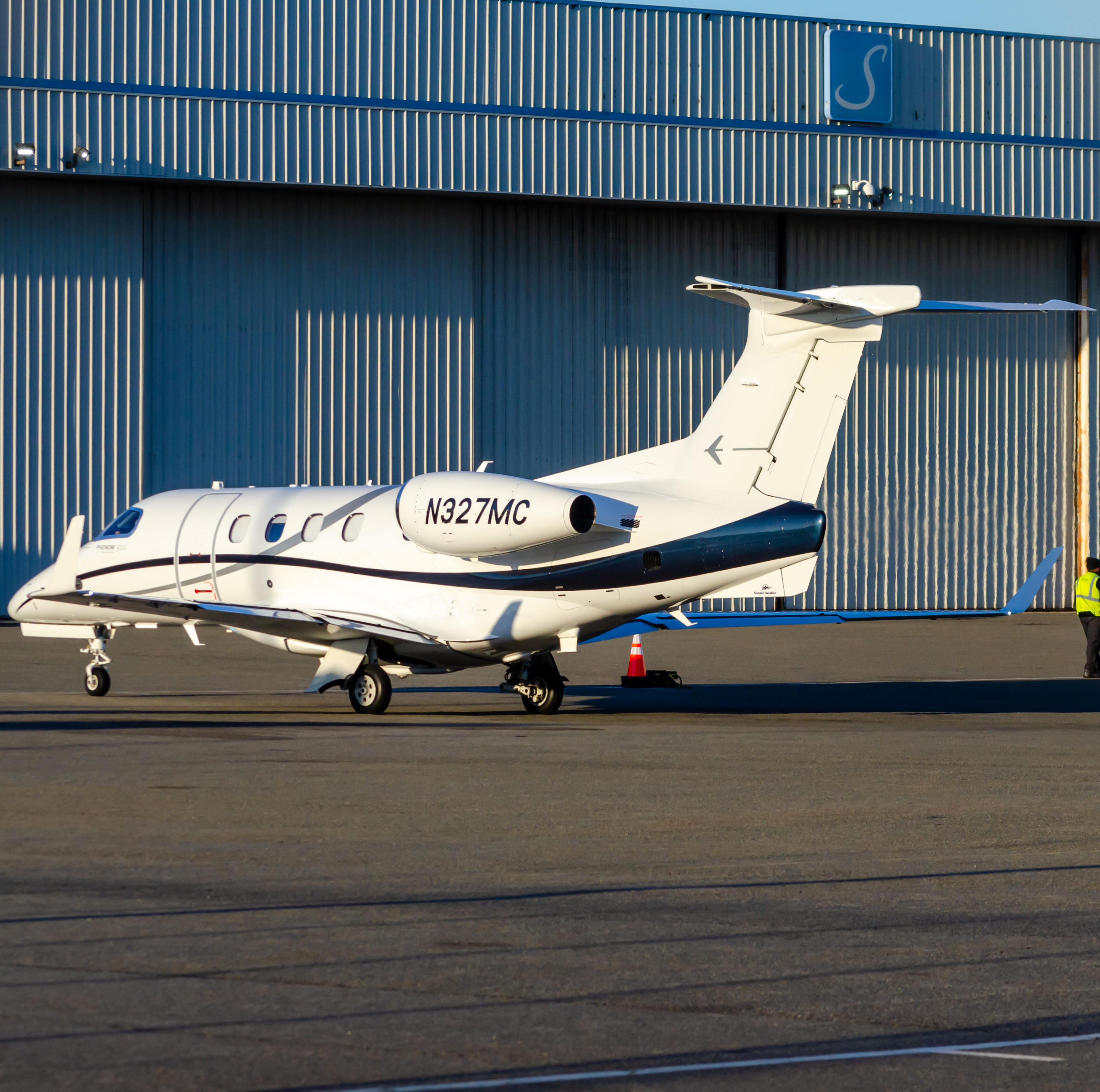 Full size: PRIVATE Embraer Phenom 300 N327MC at Newark Liberty International Airport
