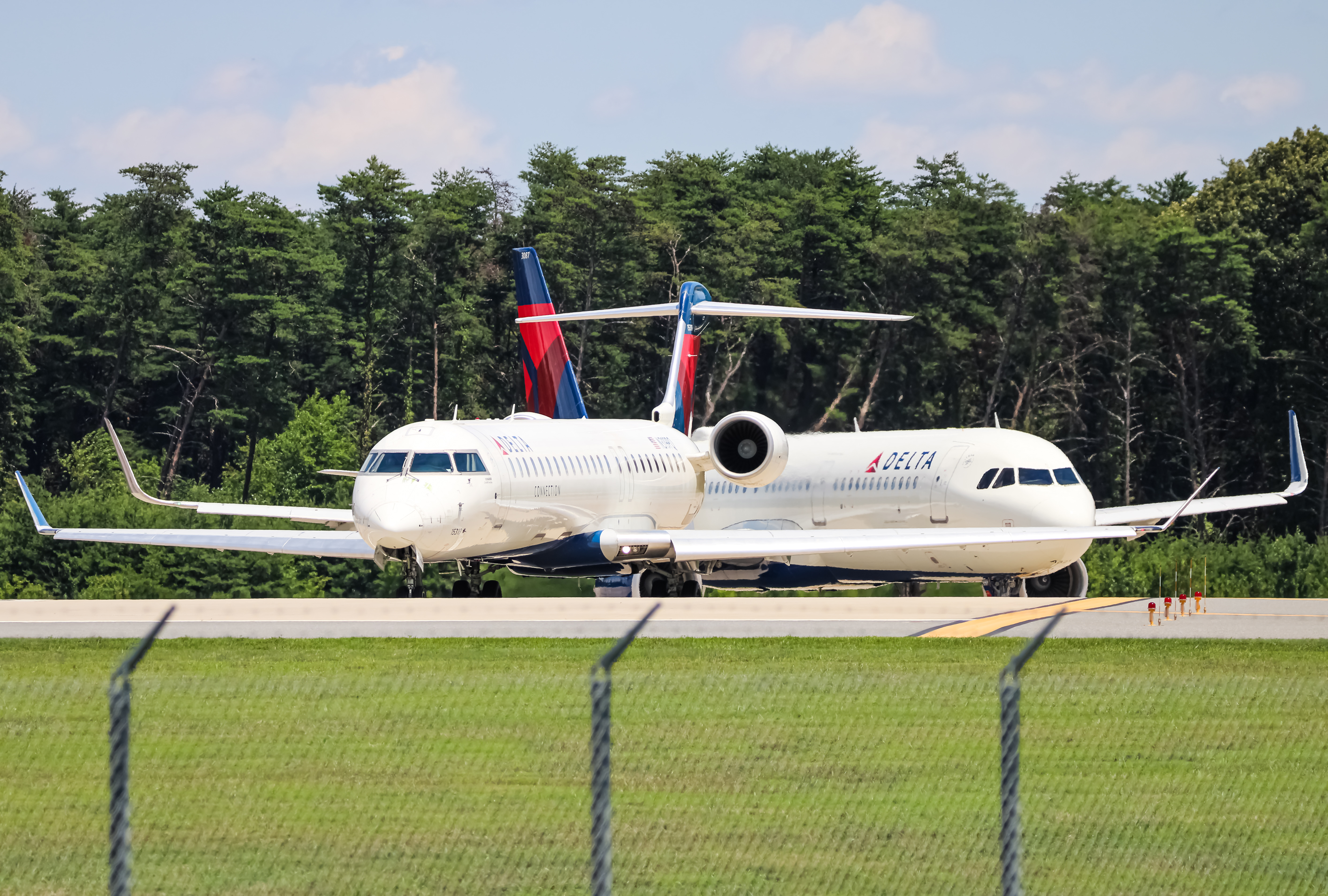 Full size: Delta Connection Mitsubishi CRJ-900 N319PQ at Baltimore/Washington International Thurgood Marshall Airport