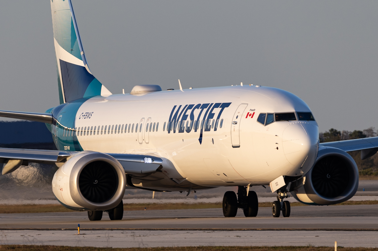 Full size: WestJet Boeing 737 MAX 8 C-FBWS at Orlando International Airport