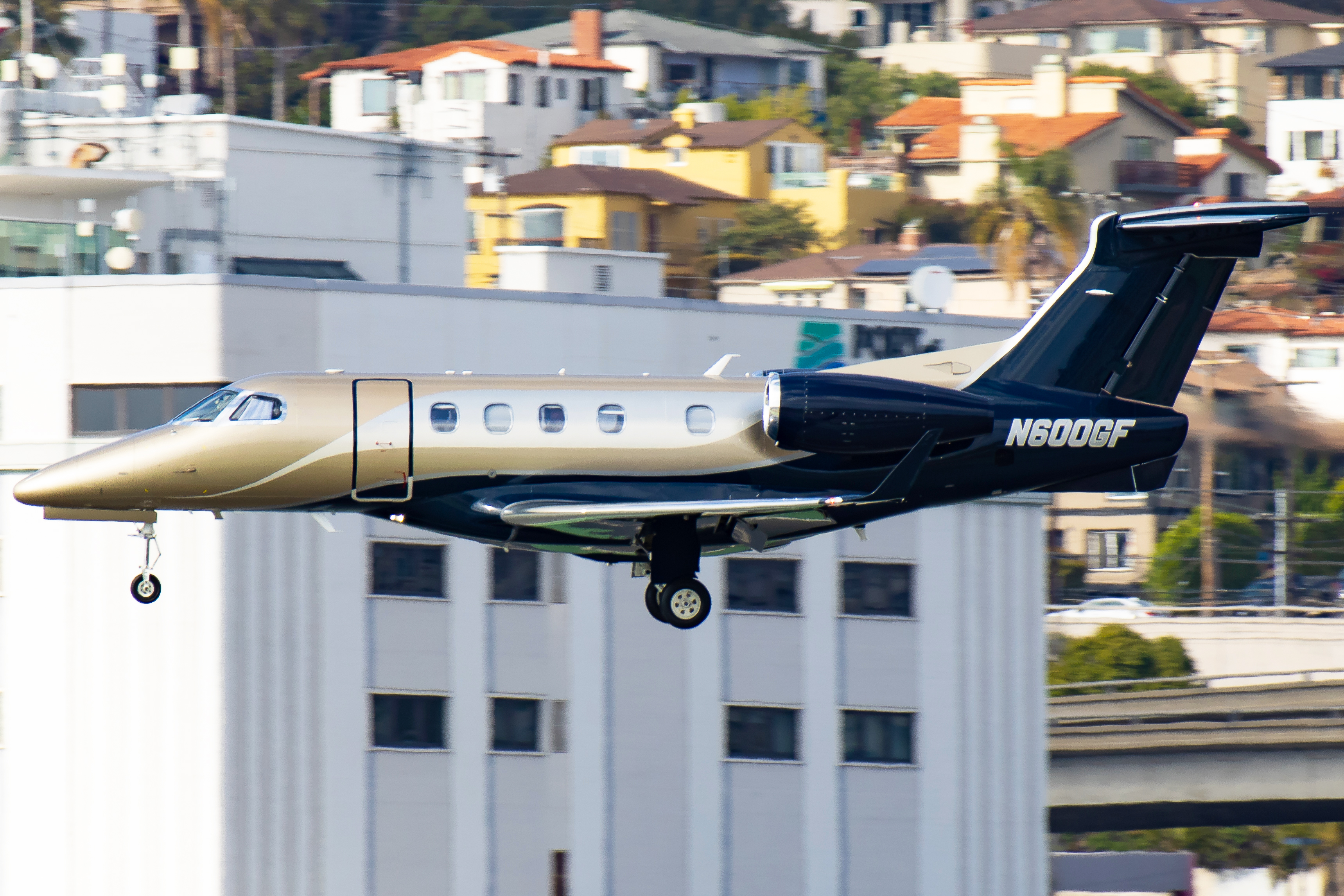 Full size: PRIVATE Embraer Phenom 300 N600GF at San Diego International Airport