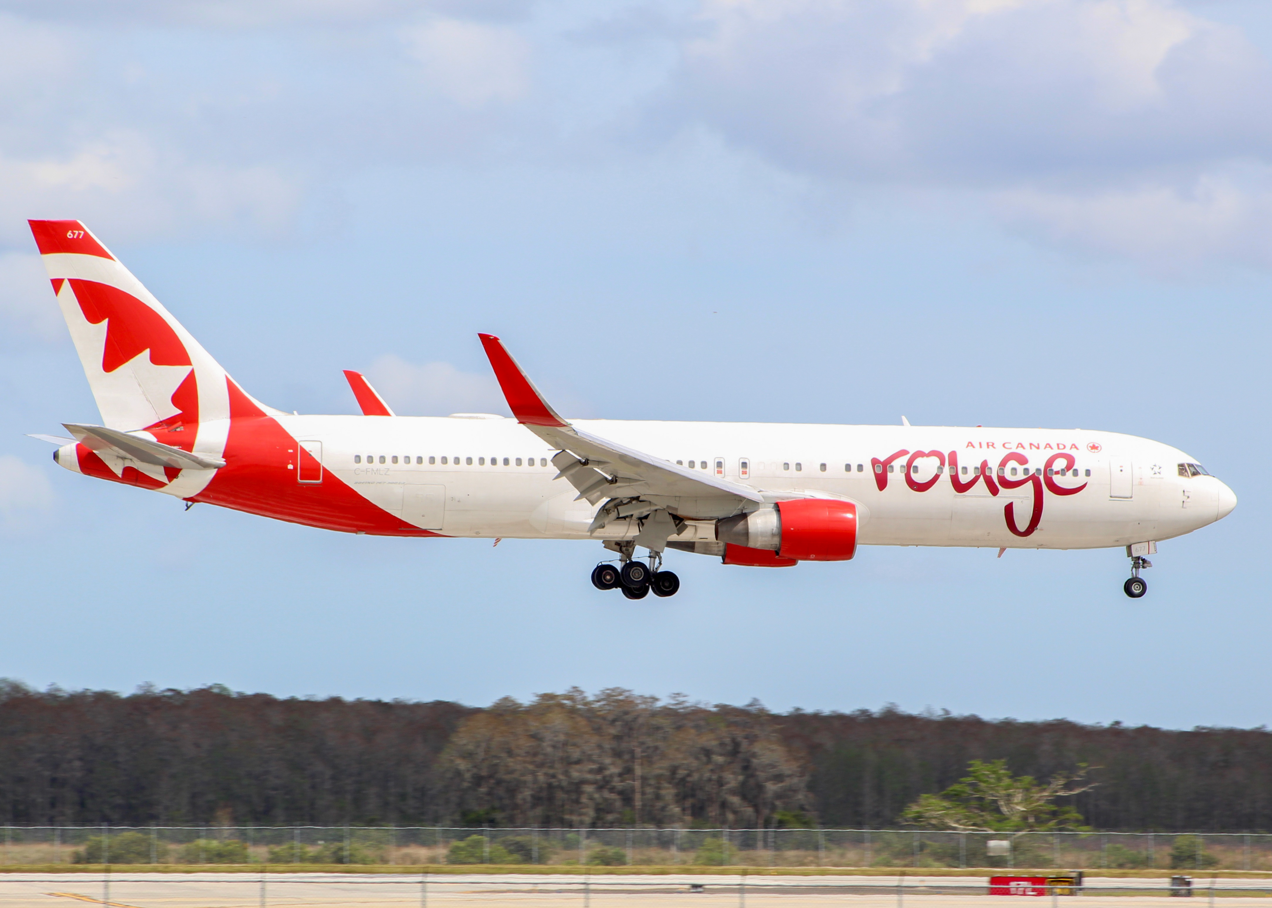 Full size: Air Canada Rouge Boeing 767-300 C-FMLZ at Orlando International Airport