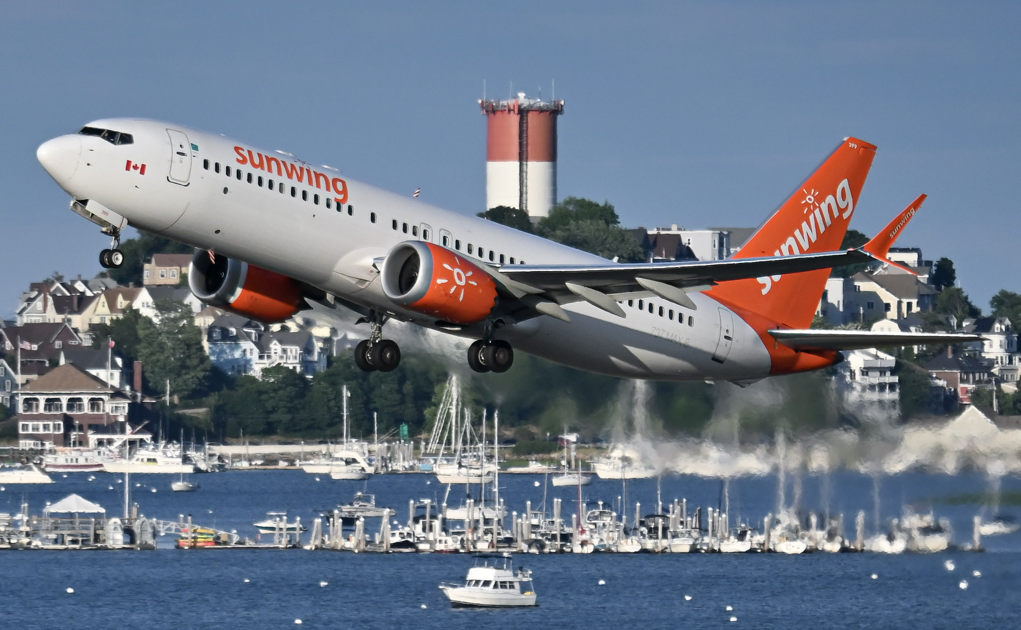 Full size: Sunwing Airlines Boeing 737 MAX 8 C-FYXC at General Edward Lawrence Logan International Airport