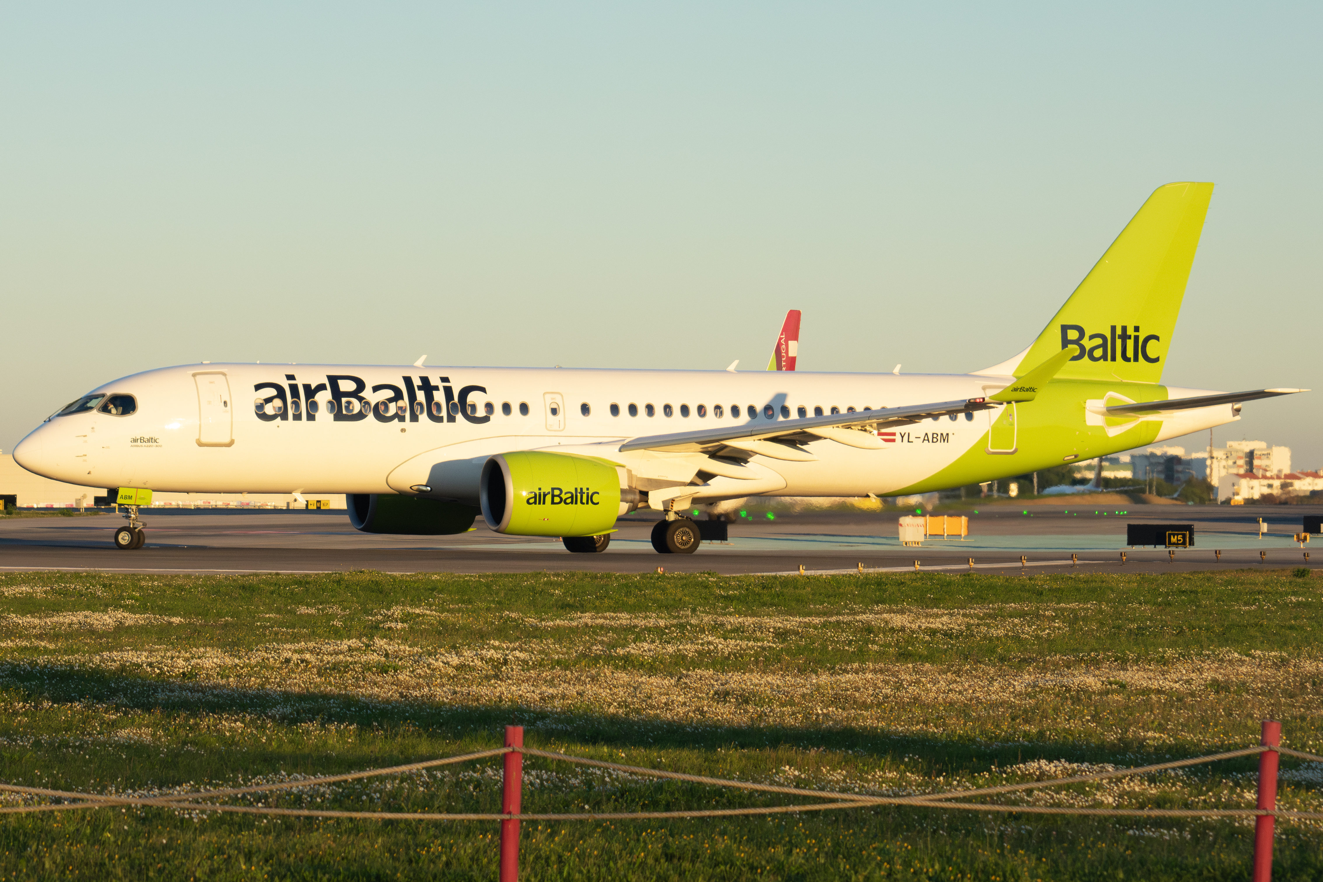 Full size: Air Baltic Airbus A220-300 YL-ABM at Lisbon Humberto Delgado Airport