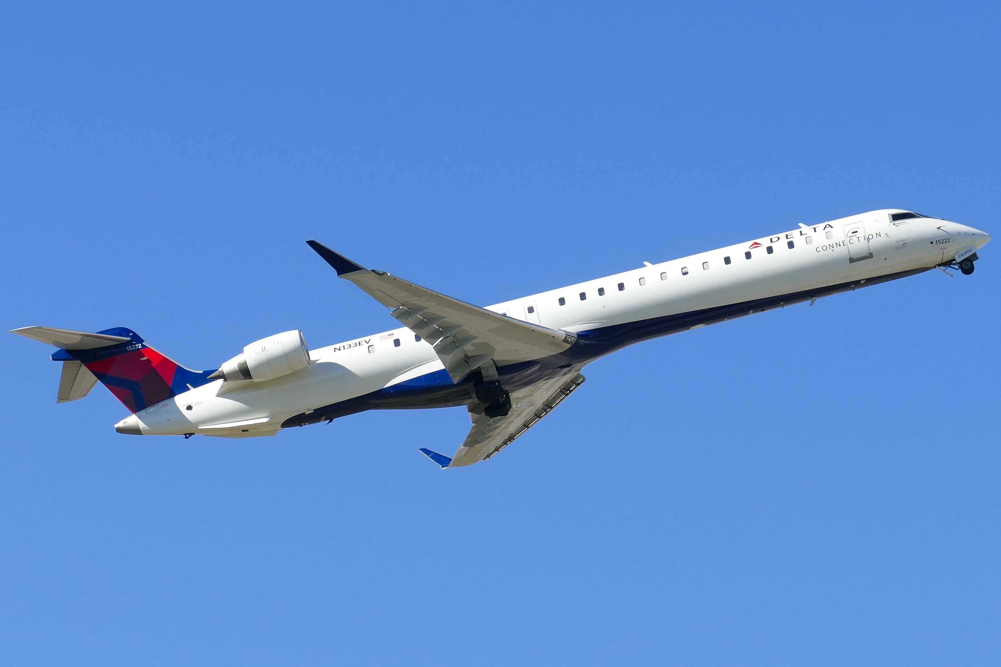 Full size: Delta Connection Mitsubishi CRJ-900 N133EV at Austin-Bergstrom International Airport