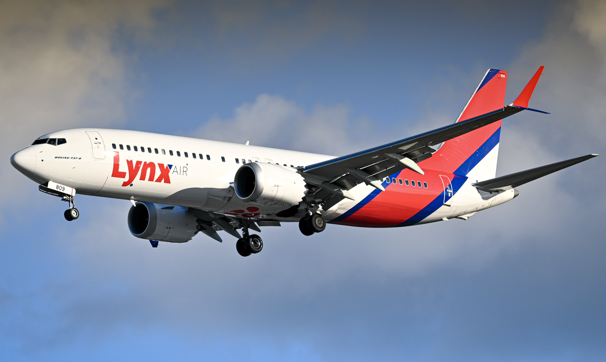 Full size: Lynx Air International Boeing 737 MAX 8 C-GJHK at Orlando International Airport