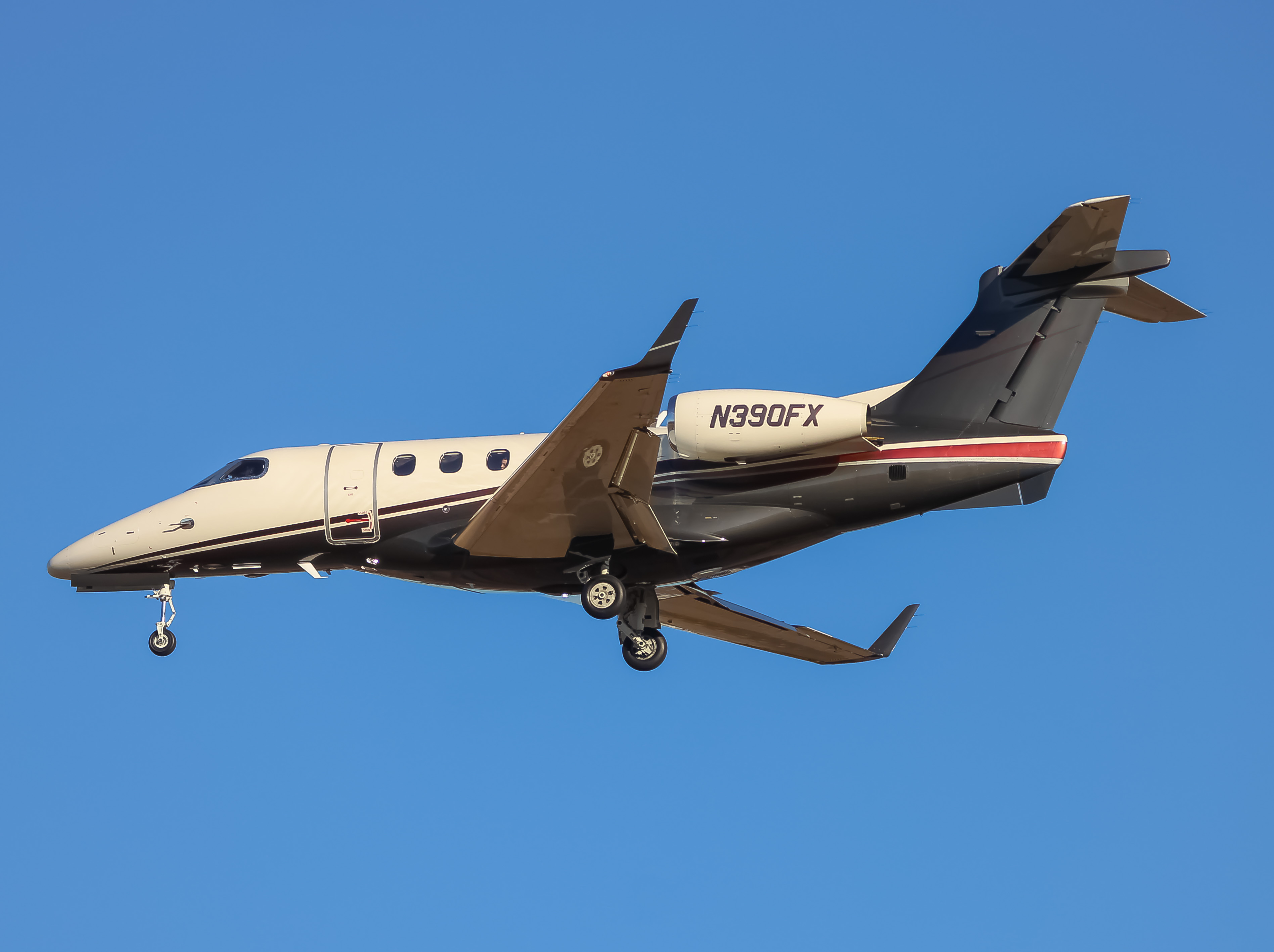 Full size: PRIVATE Embraer Phenom 300 N390FX at Washington Dulles International Airport