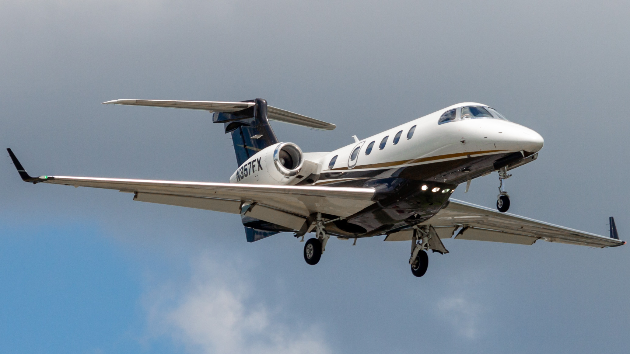 Full size: FlexJet Embraer Phenom 300 N357FX at William P Hobby Airport
