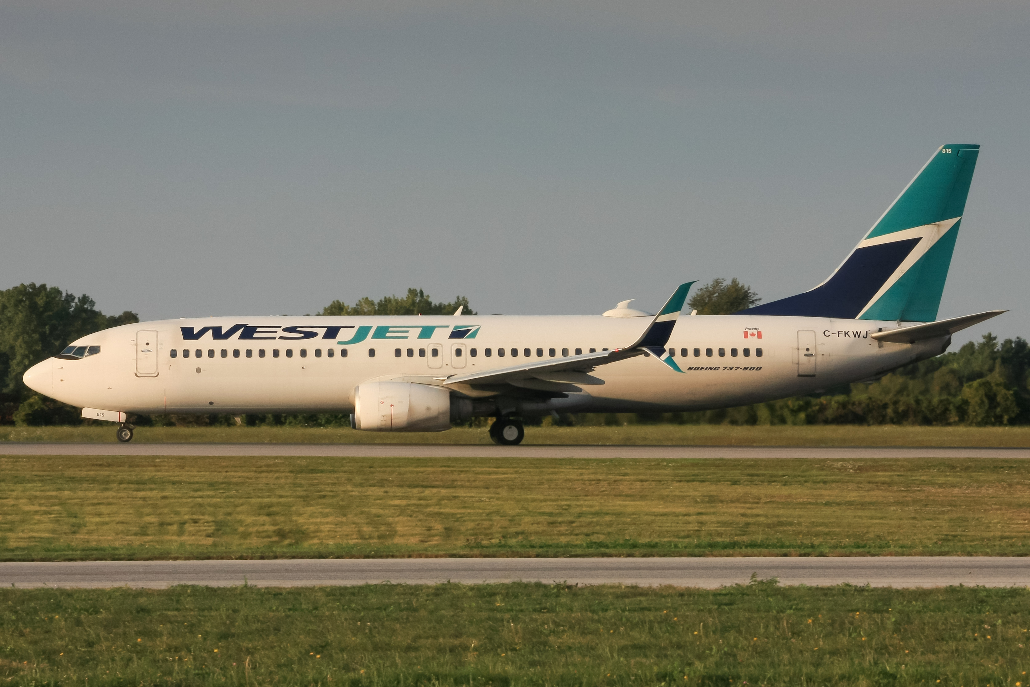 Full size: WestJet Boeing 737-800 C-FKWJ at Hamilton John C. Munro International Airport