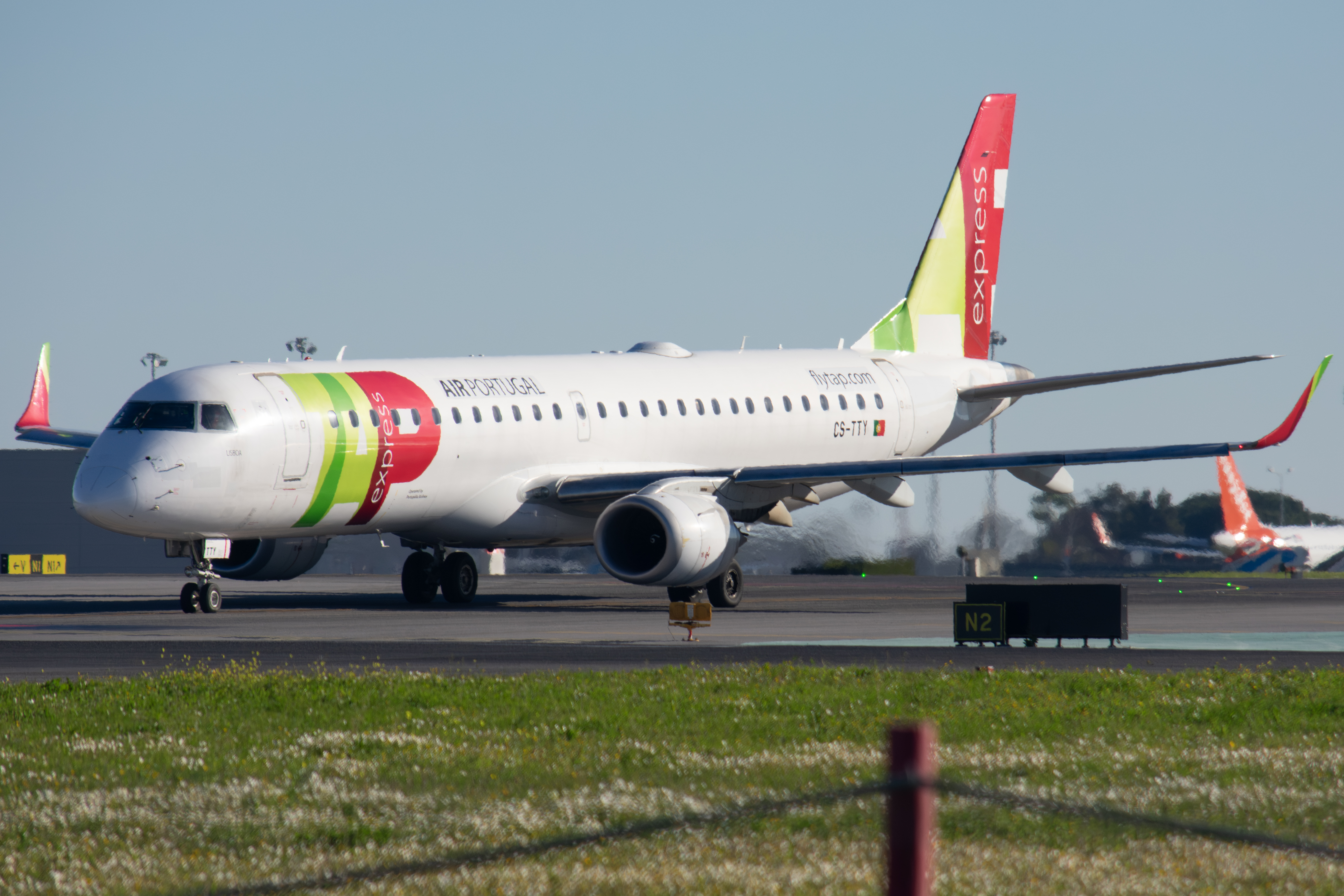 Full size: TAP Express Embraer E195 CS-TTY at Lisbon Humberto Delgado Airport