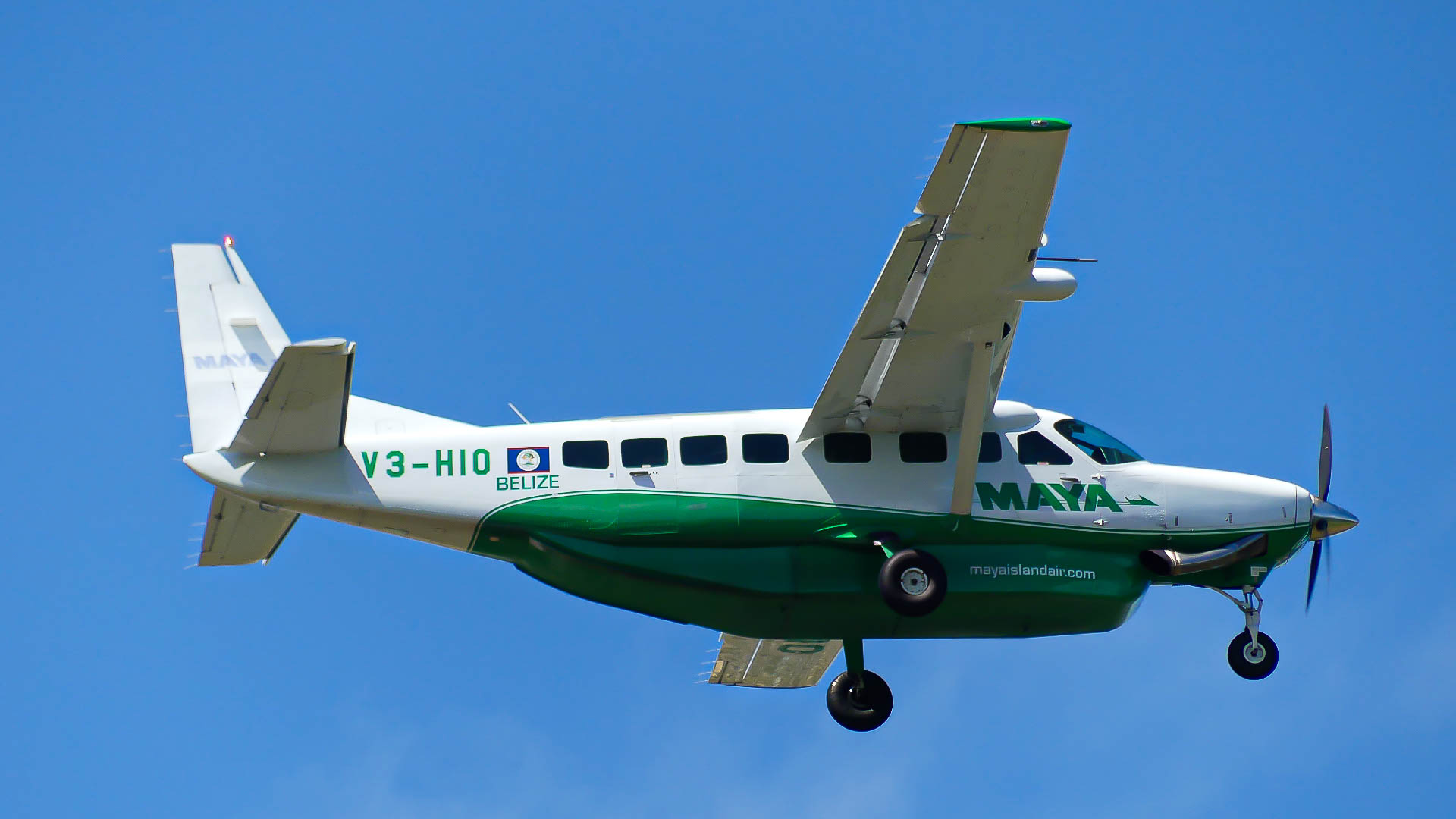Full size: Maya Island Air  Cessna 208 Grand Caravan V3-HIO at Belize City Philip S. W. Goldson International Airport
