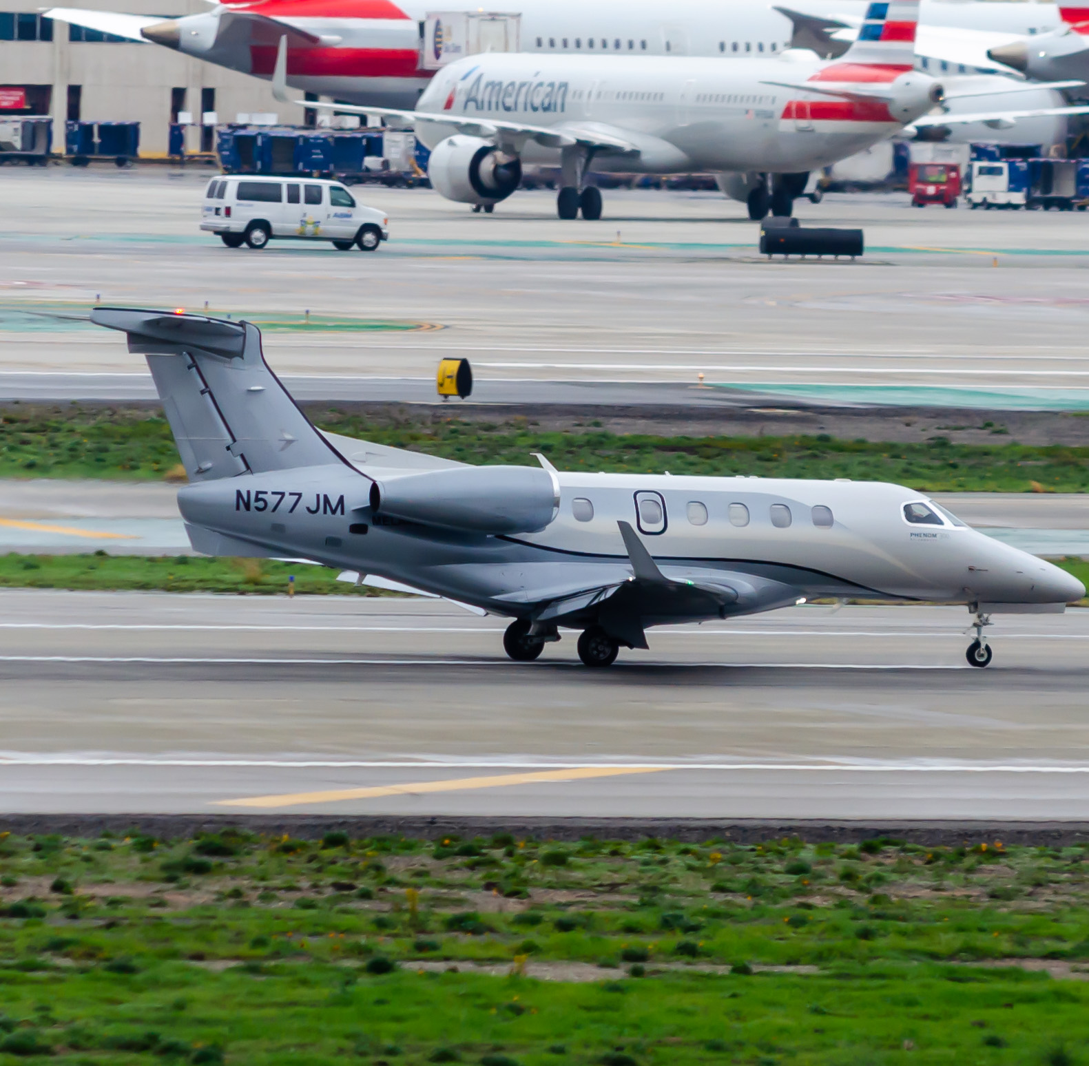 Full size: PRIVATE Embraer Phenom 300 N577JM at Los Angeles International Airport